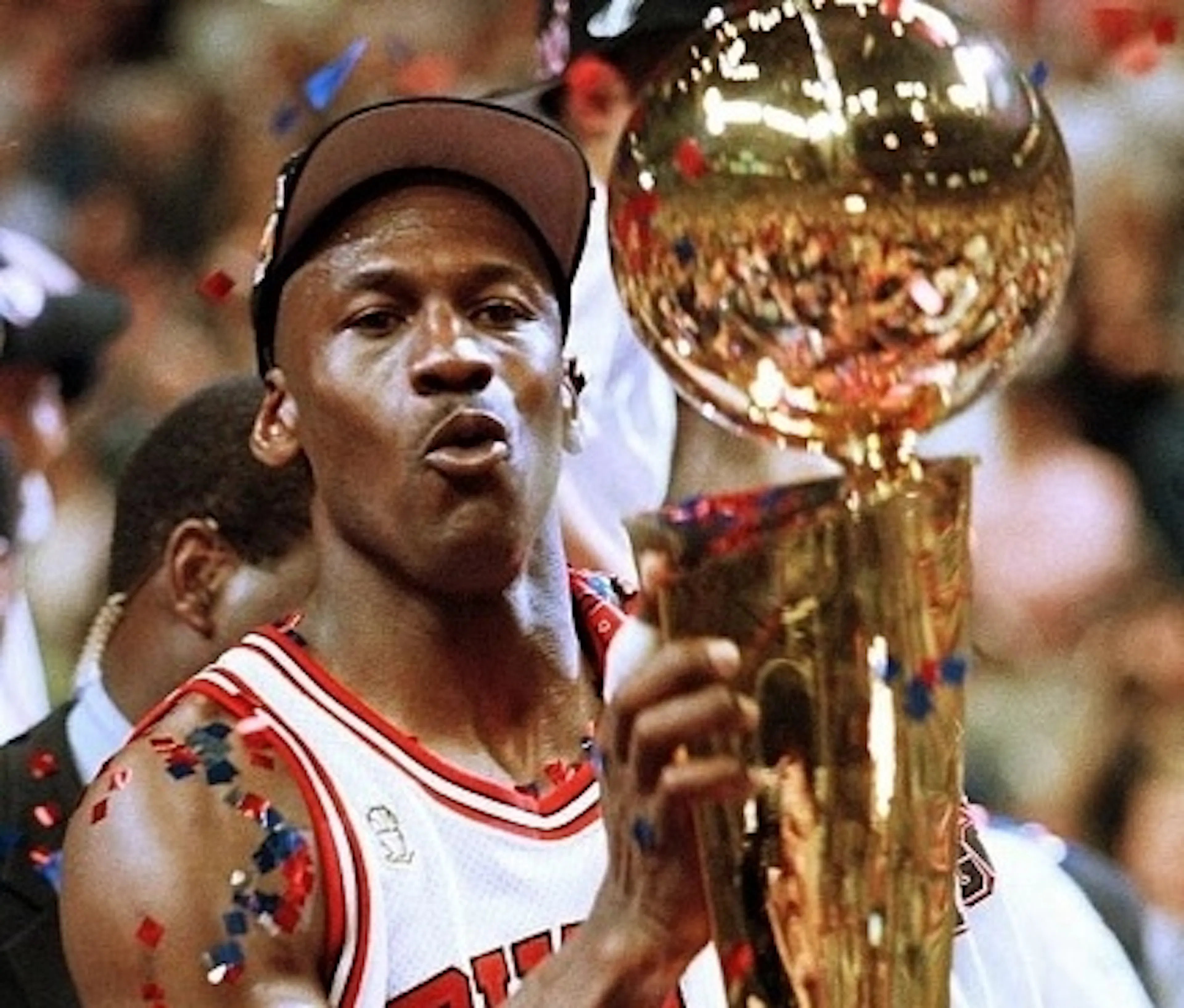 Michael Jordan holding trophy