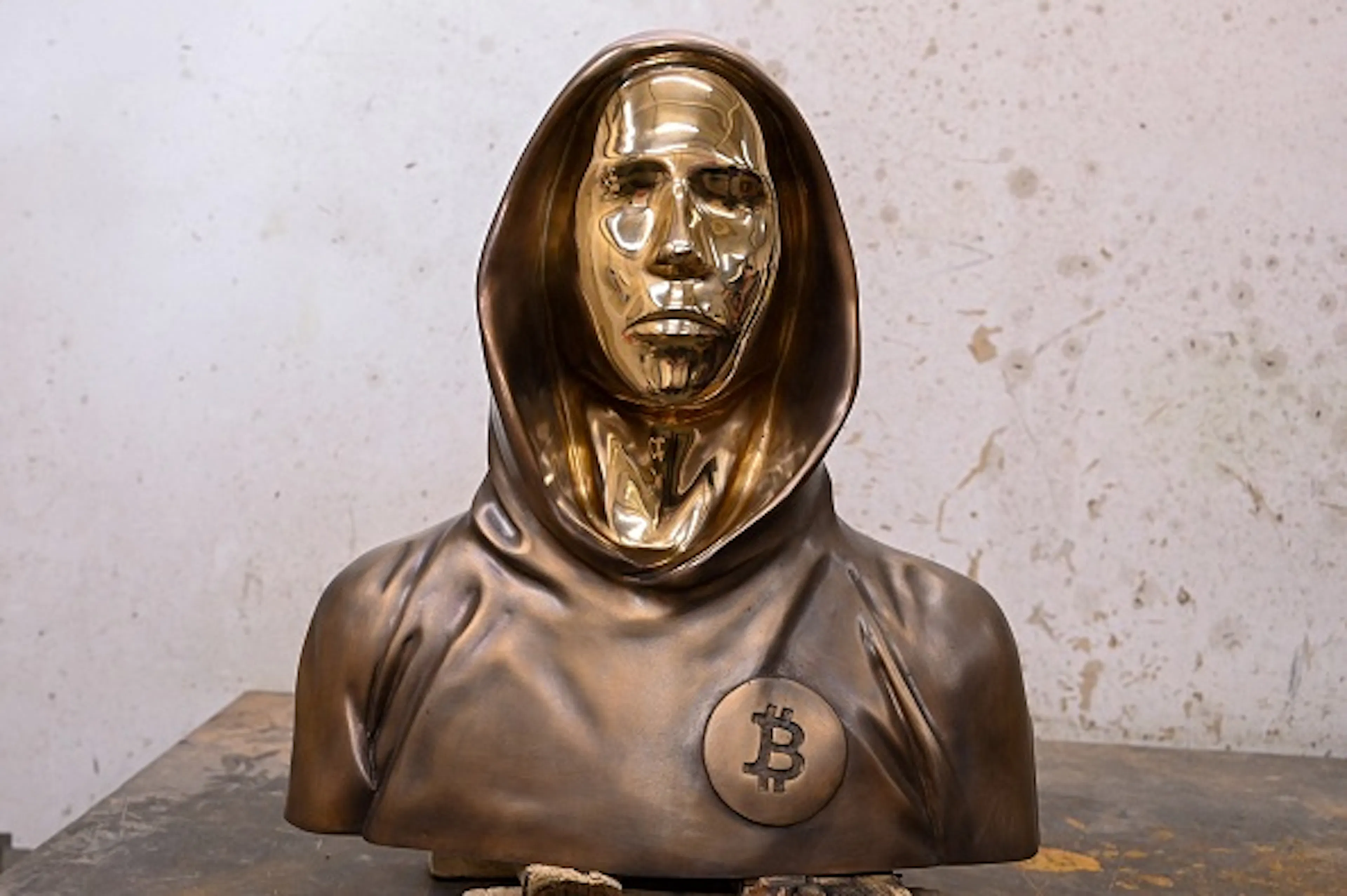 A bronze statue of pseudonymous bitcoin creator Satoshi Nakamoto 