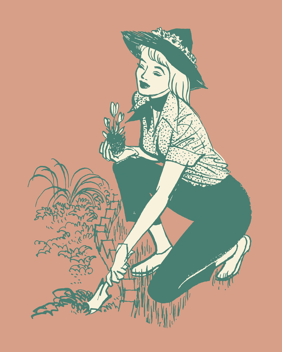 Young woman planting flowers in garden