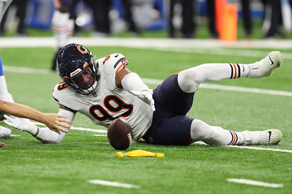 Trevis Gipson #99 of the Chicago Bears recovers a fumble by Jared Goff #16 of the Detroit Lions during the second quarter at Ford Field on November 25, 2021 in Detroit, Michigan.