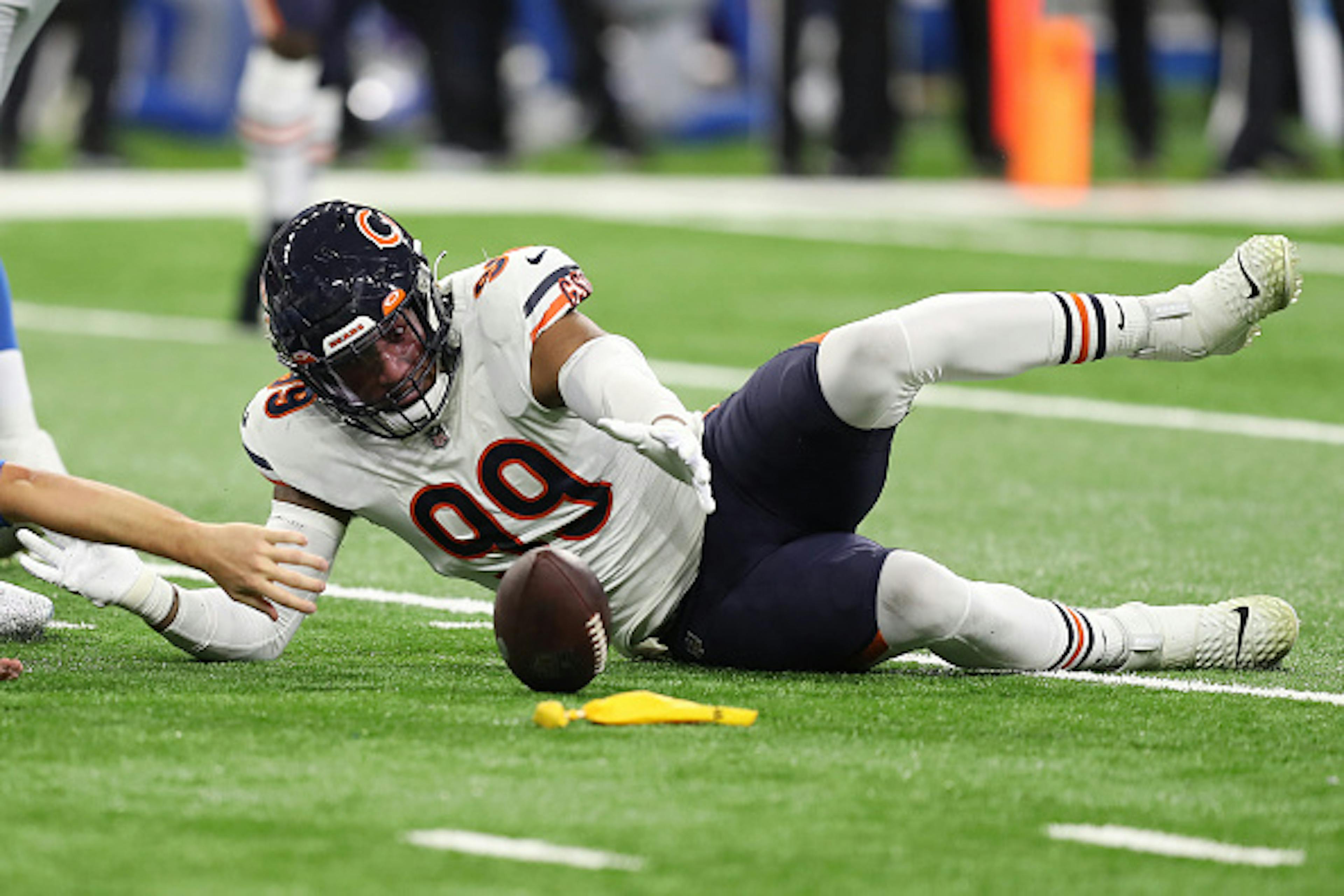 Trevis Gipson #99 of the Chicago Bears recovers a fumble by Jared Goff #16 of the Detroit Lions during the second quarter at Ford Field on November 25, 2021 in Detroit, Michigan.