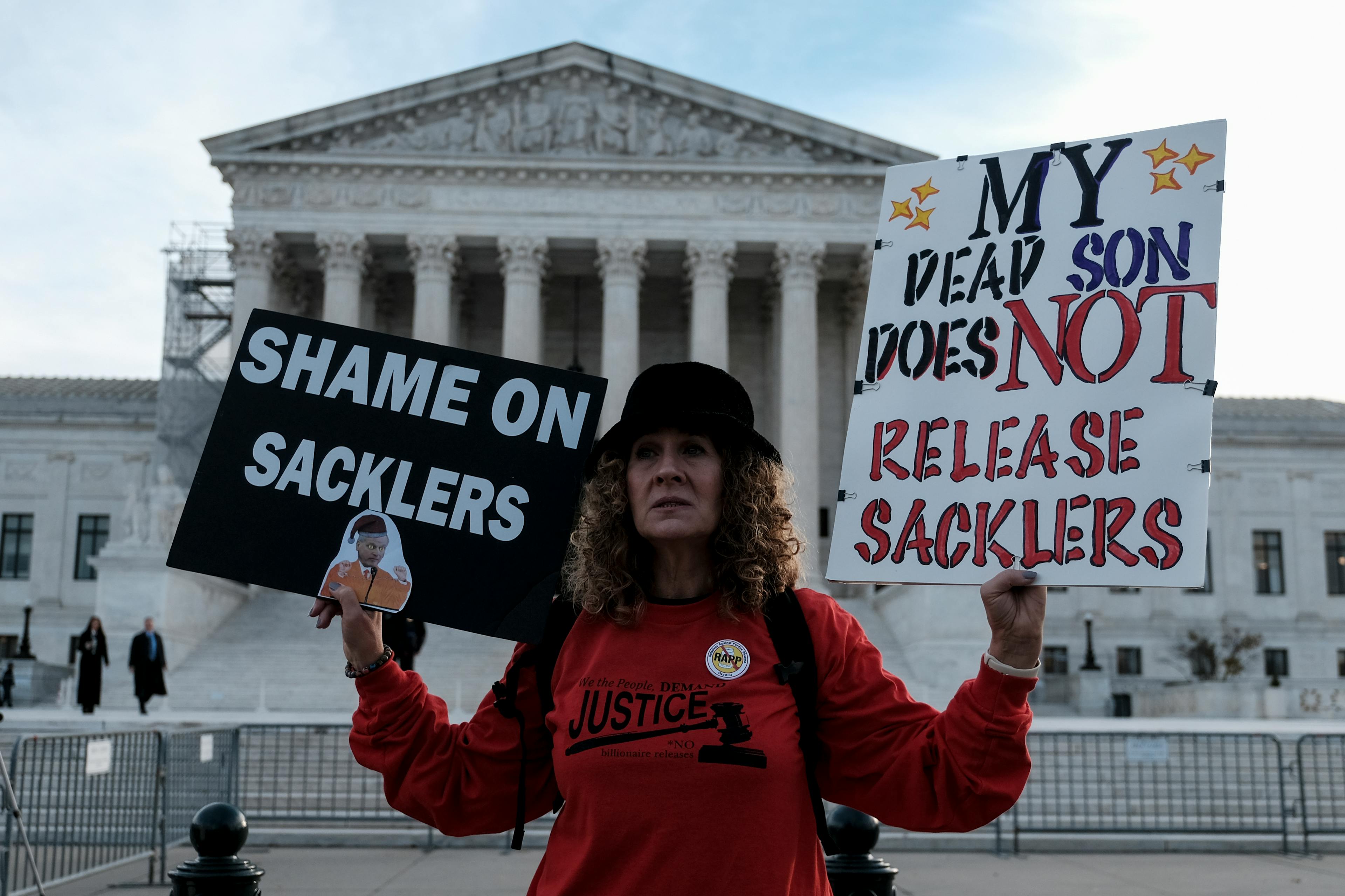 Woman protesting at Supreme Court.
