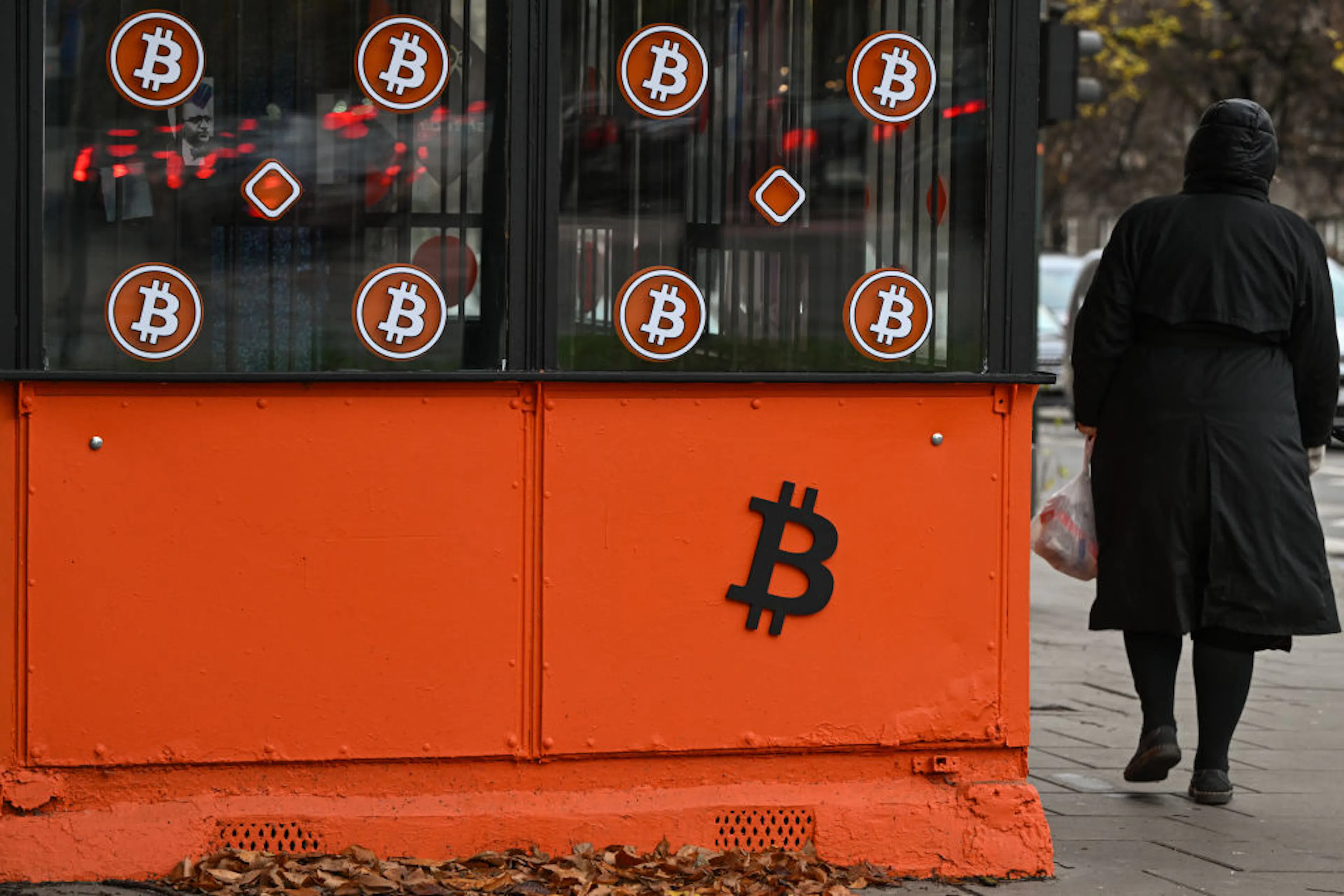 A Bitcoin symbol displayed outside a Bitcoin ATM, on November 20, 2024 in Krakow, Poland. 