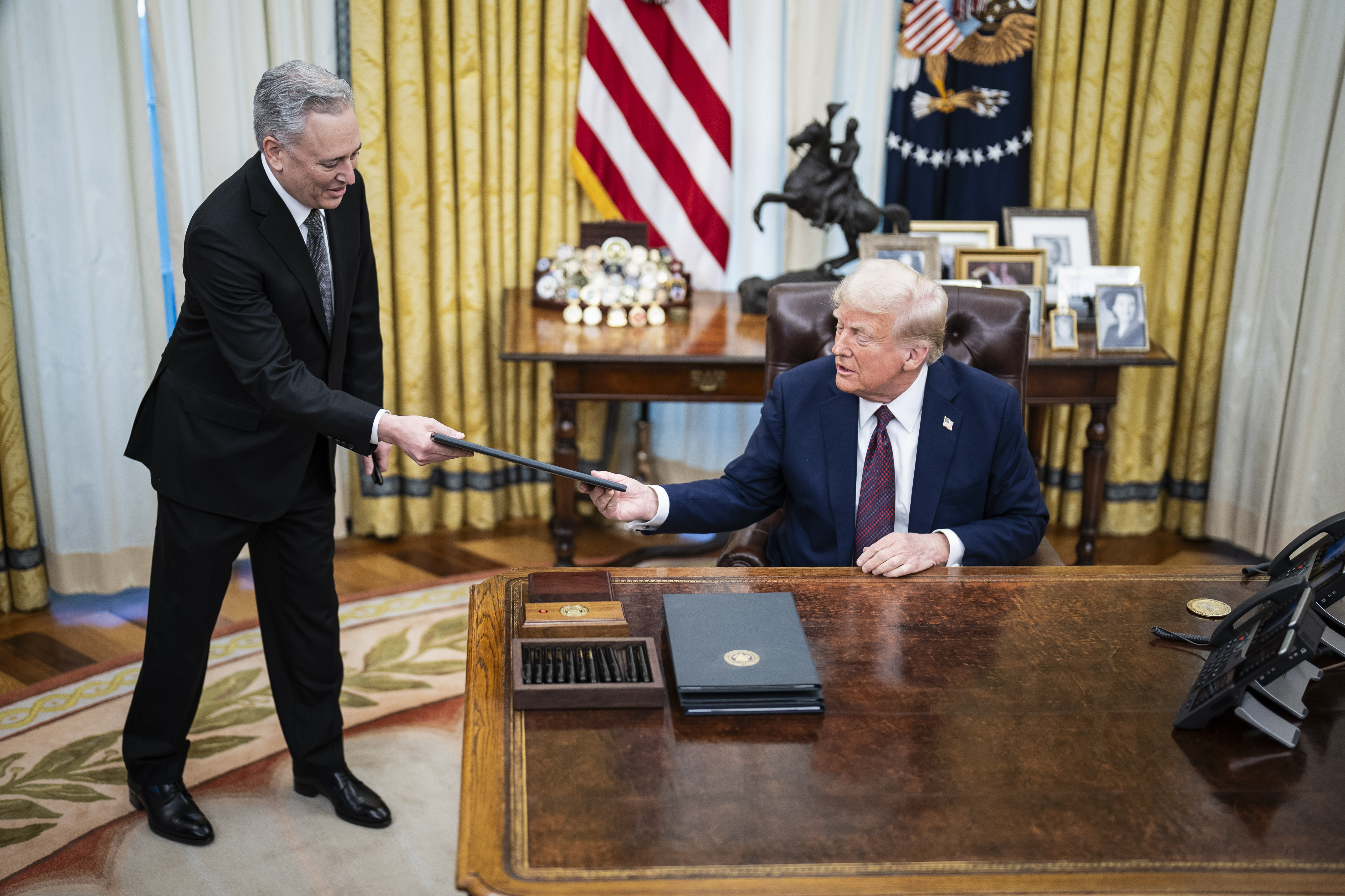 Crypto Czar David Sacks speaks with President Donald J Trump as he signs executive orders in the Oval Office at the White House on Thursday, Jan 23, 2025