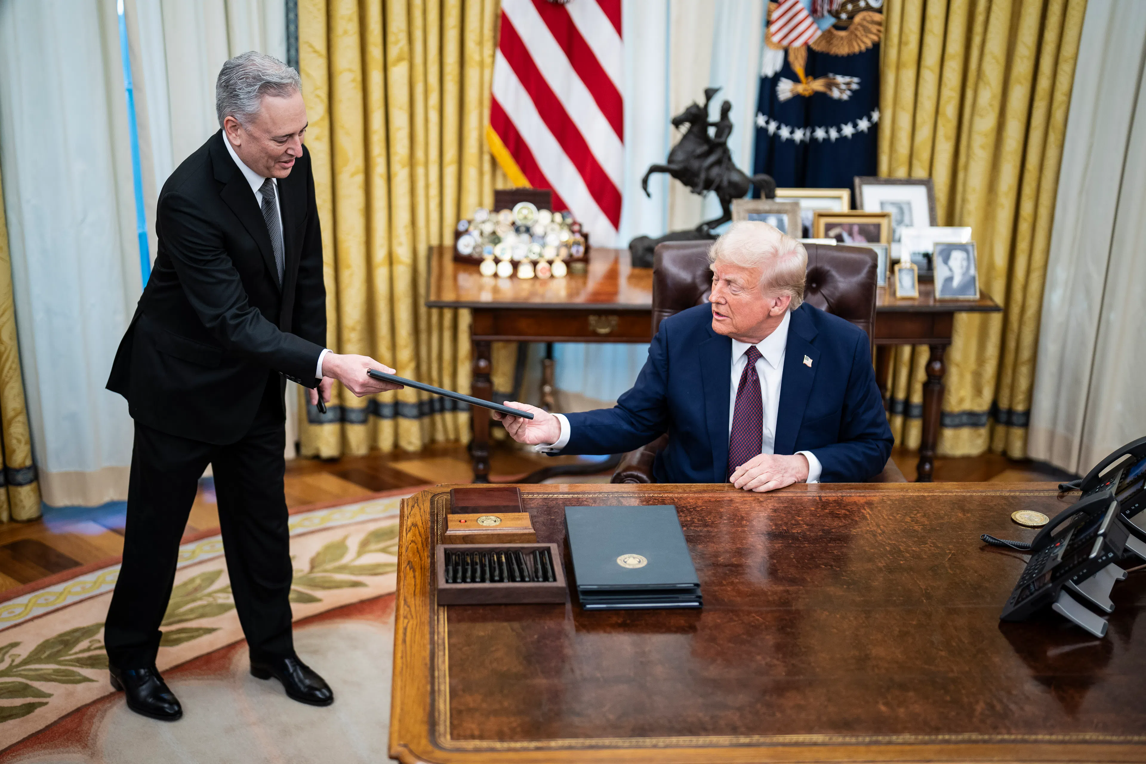 Crypto Czar David Sacks speaks with President Donald J Trump as he signs executive orders in the Oval Office at the White House on Thursday, Jan 23, 2025