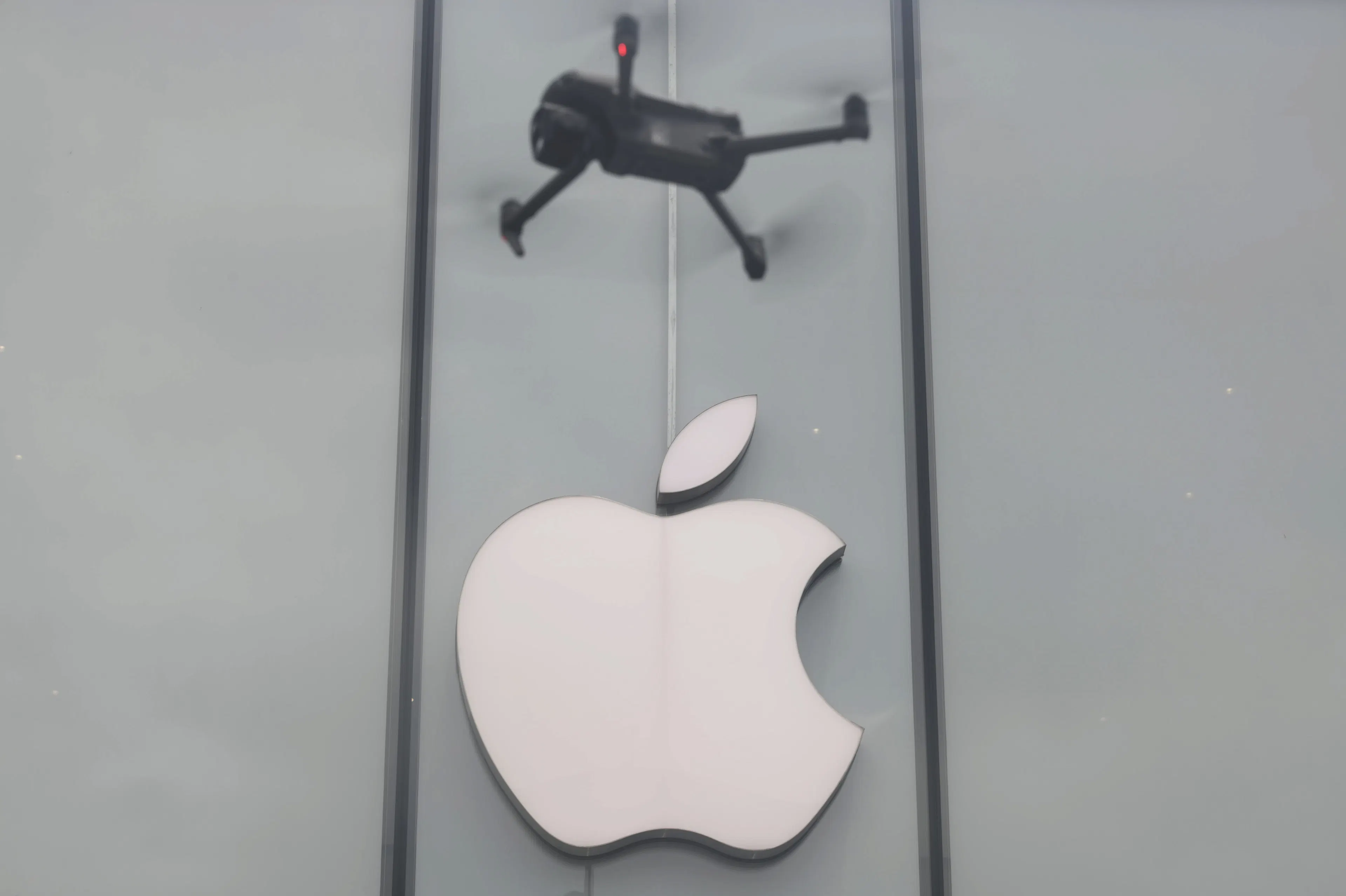 A DJI drone flew over an Apple flagship store in Hangzhou, Zhejiang Province, China