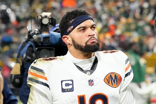 GREEN BAY, WISCONSIN - DECEMBER 07: Caleb Williams #18 of the Chicago Bears walks off the field after a loss to the Green Bay Packers at Lambeau Field on December 07, 2025 in Green Bay, Wisconsin. (Photo by John Fisher/Getty Images)