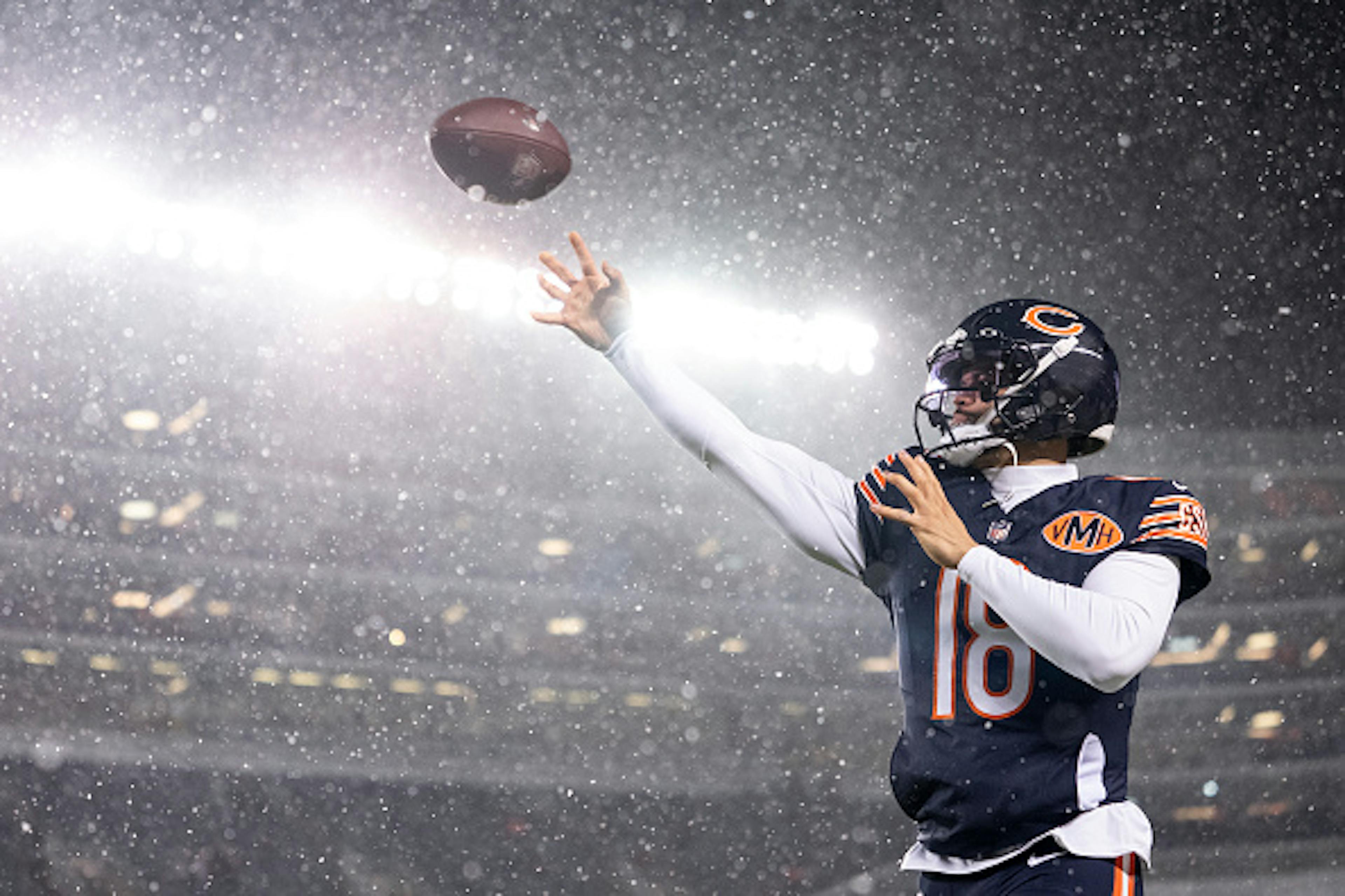 CHICAGO, ILLINOIS - JANUARY 10: Caleb Williams #18 of the Chicago Bears throws a pass prior to an NFL wild card playoff game against the Green Bay Packers at Soldier Field on January 10, 2026 in Chicago, Illinois.