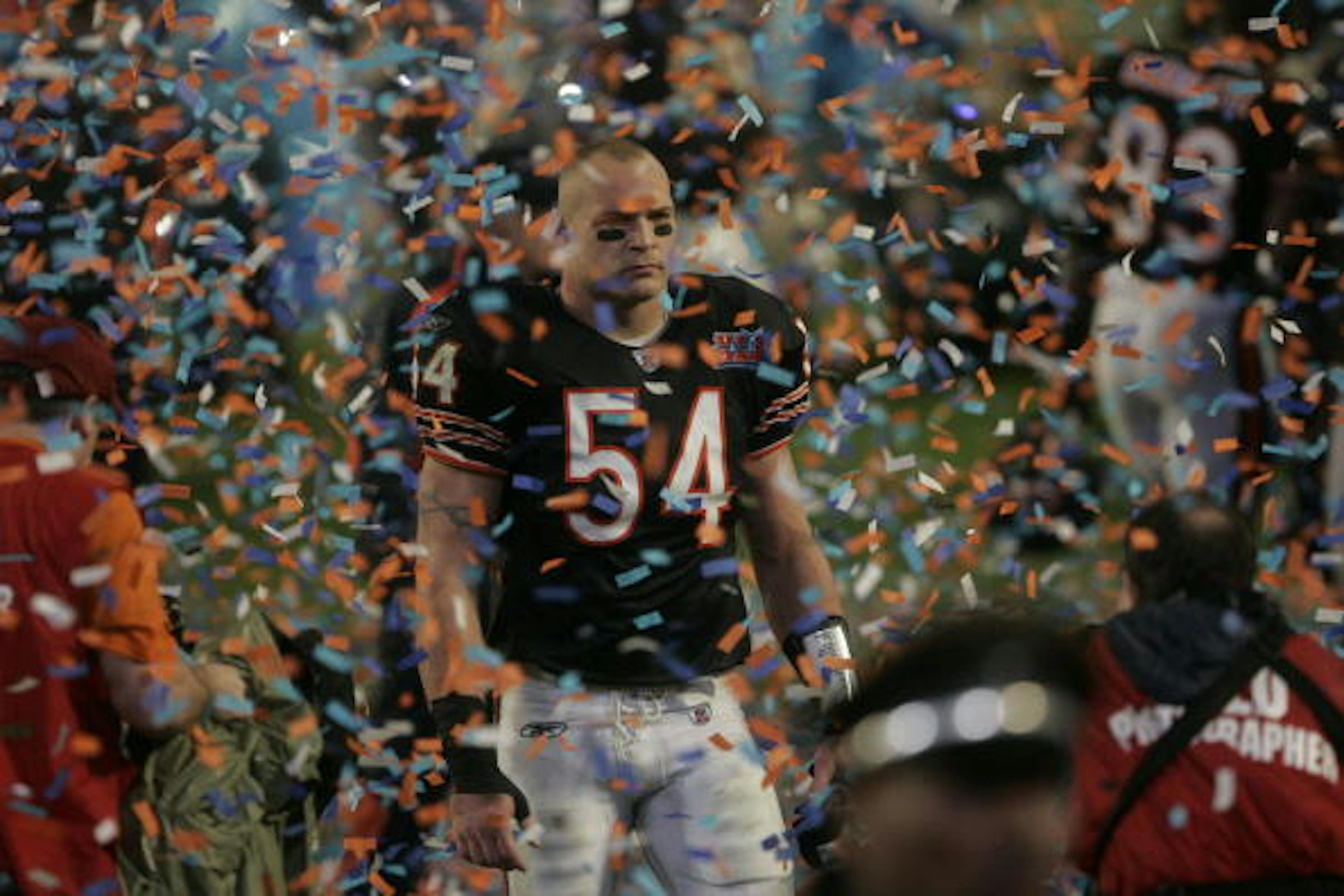 UNITED STATES - FEBRUARY 04: Football: Super Bowl XLI, Chicago Bears Brian Urlacher (54) upset after losing game vs Indianapolis Colts, Confetti, Miami, FL 2/4/2007