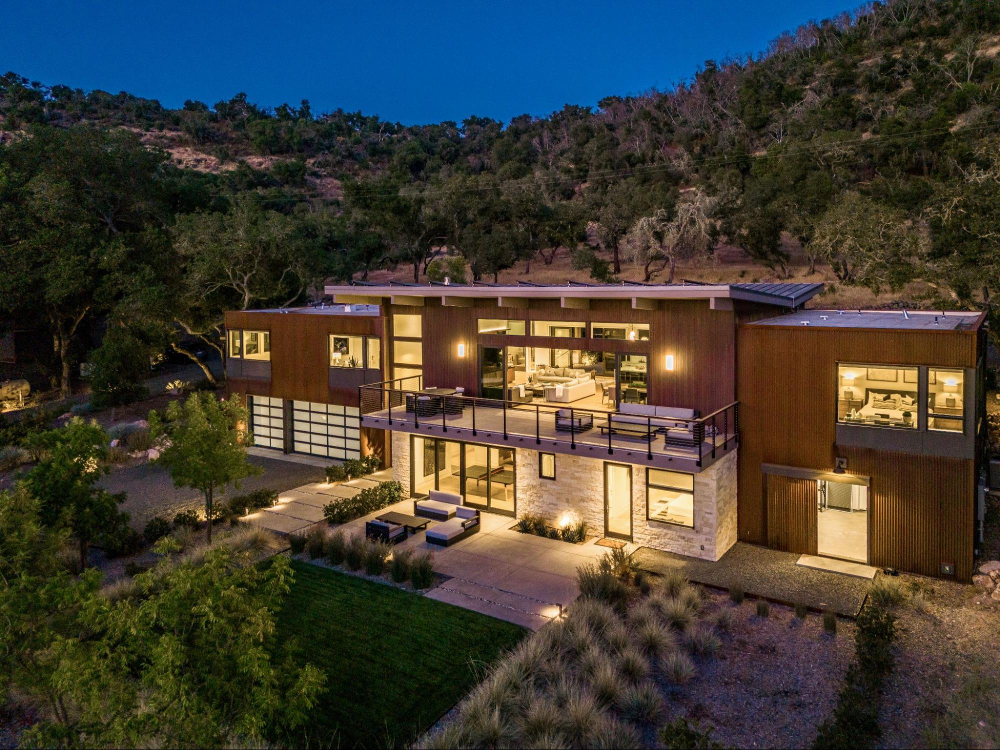 A luxury house in a mountainous area at night 