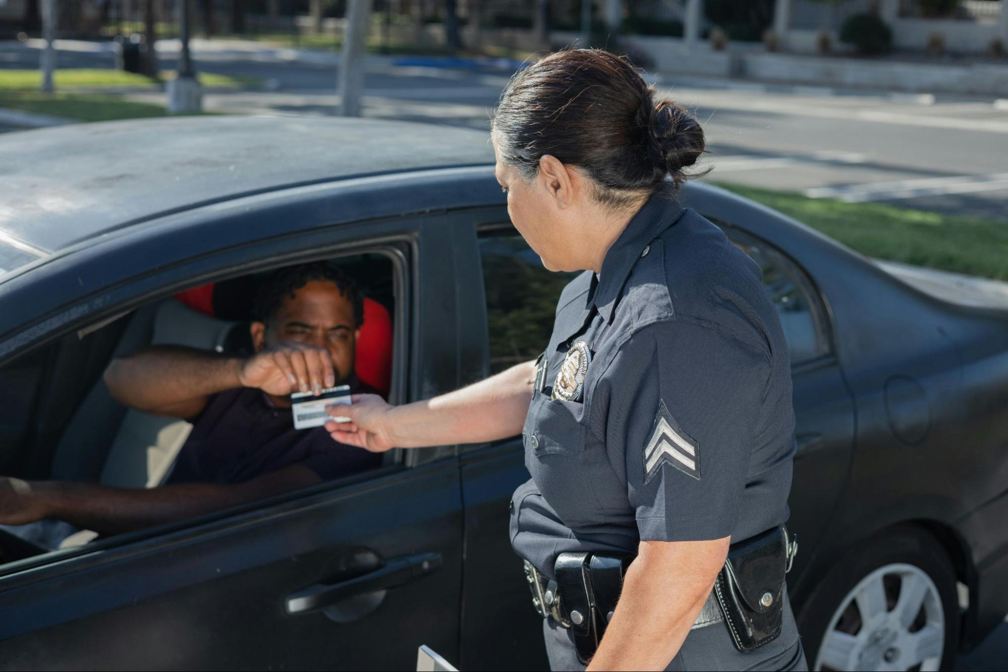 Police officer issuing ticket