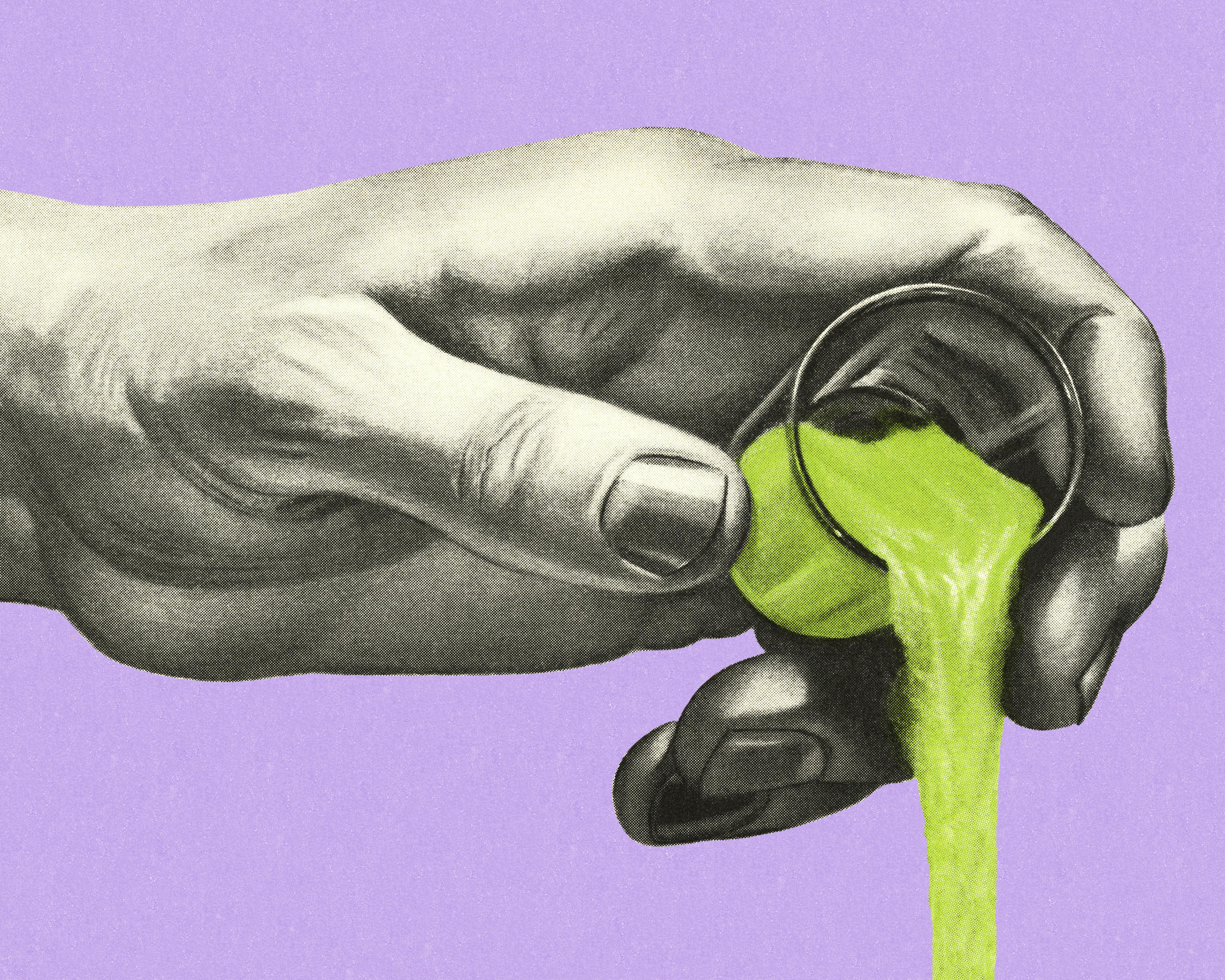 Hand Pouring a Green Liquid