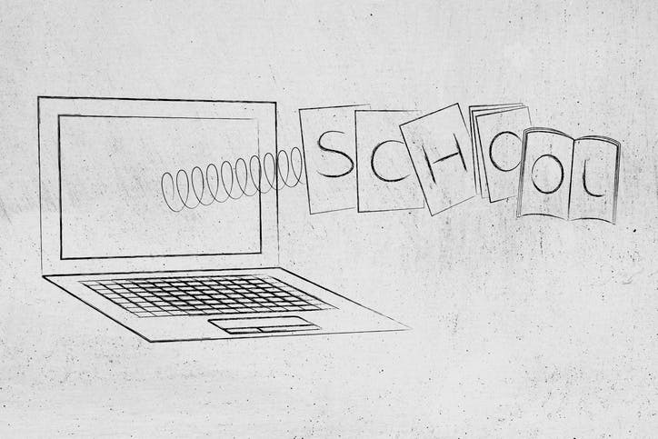 laptop with School textbooks popping out of the screen on a spring