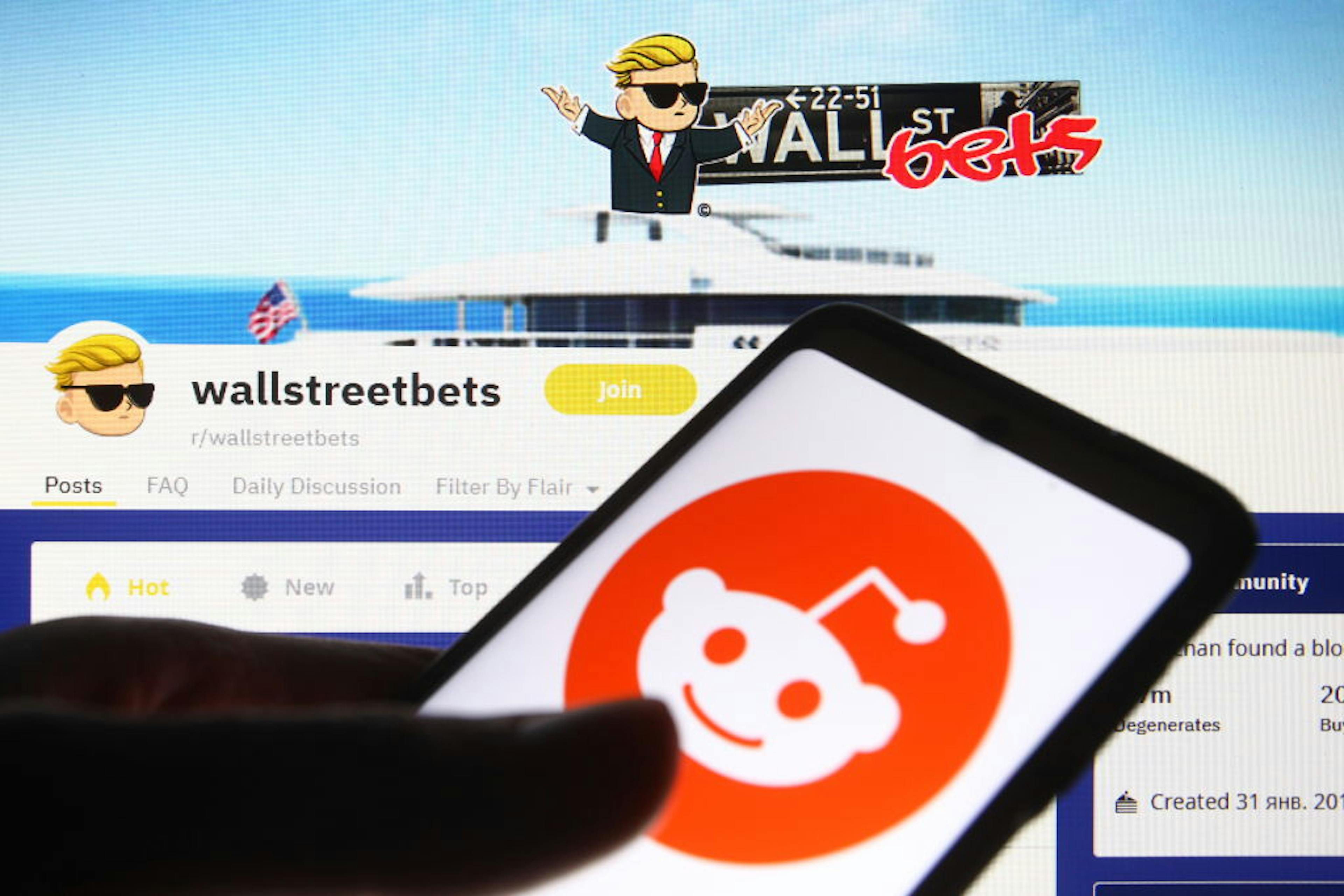 In this photo illustration a Reddit logo is seen on a mobile...