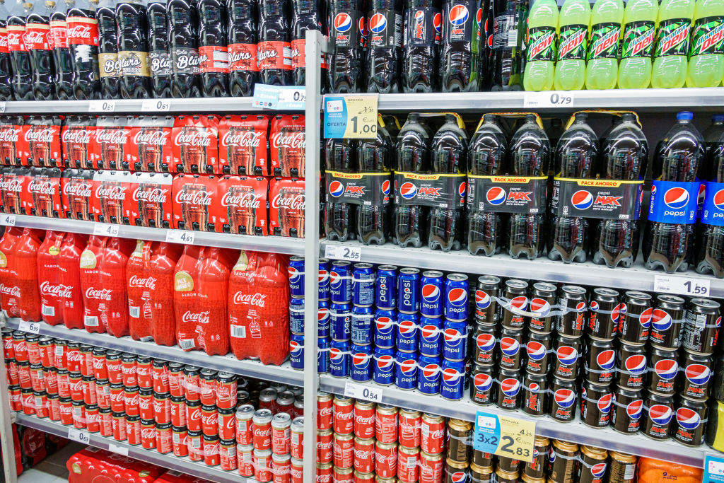 Coca cola and Pepsi products in Spanish soda aisle
