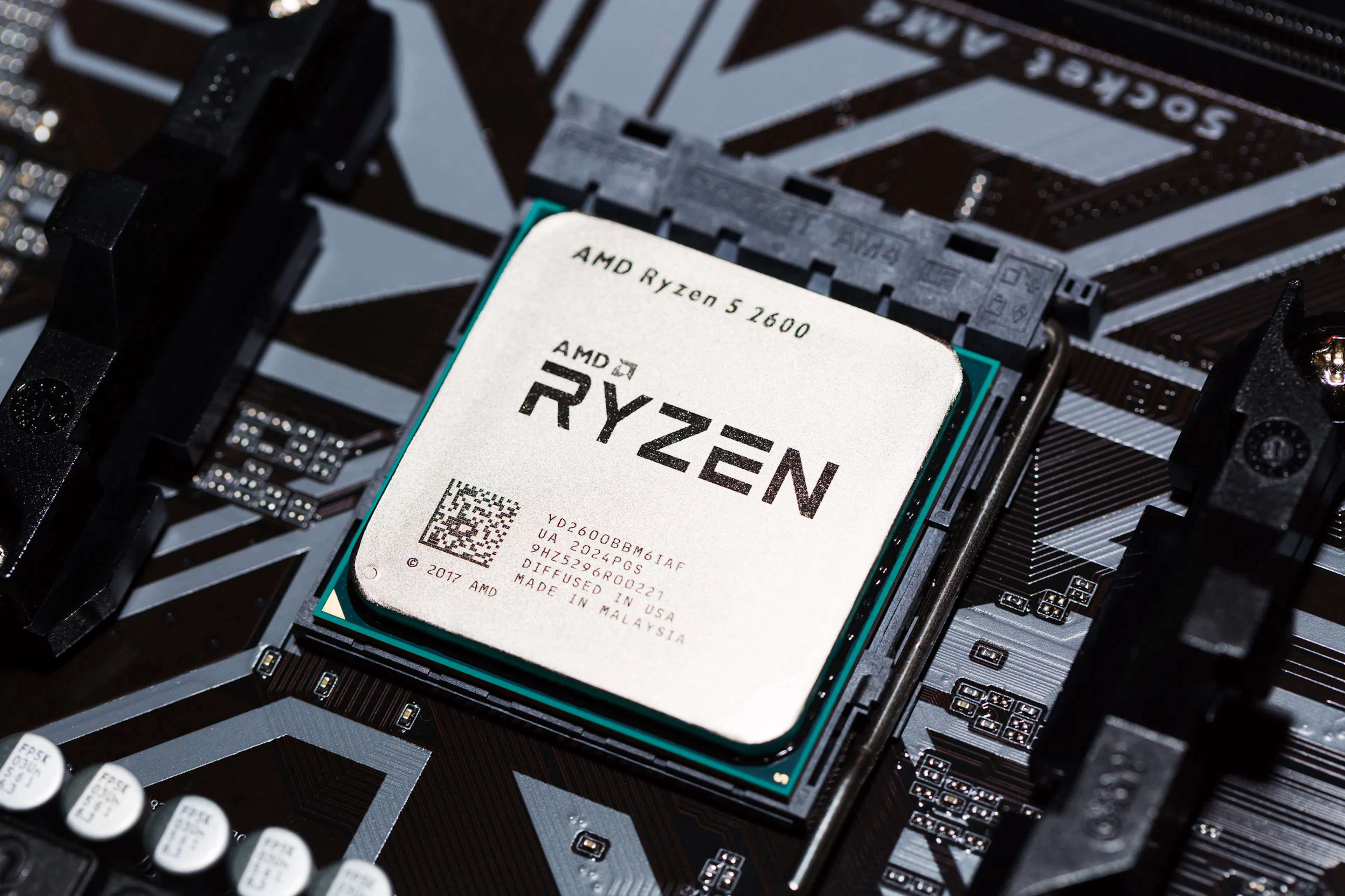 AMD Ryzen 5 2600 Processor close up in the black motherboard CPU socket. Advanced Micro Devices is an American semiconductor company 