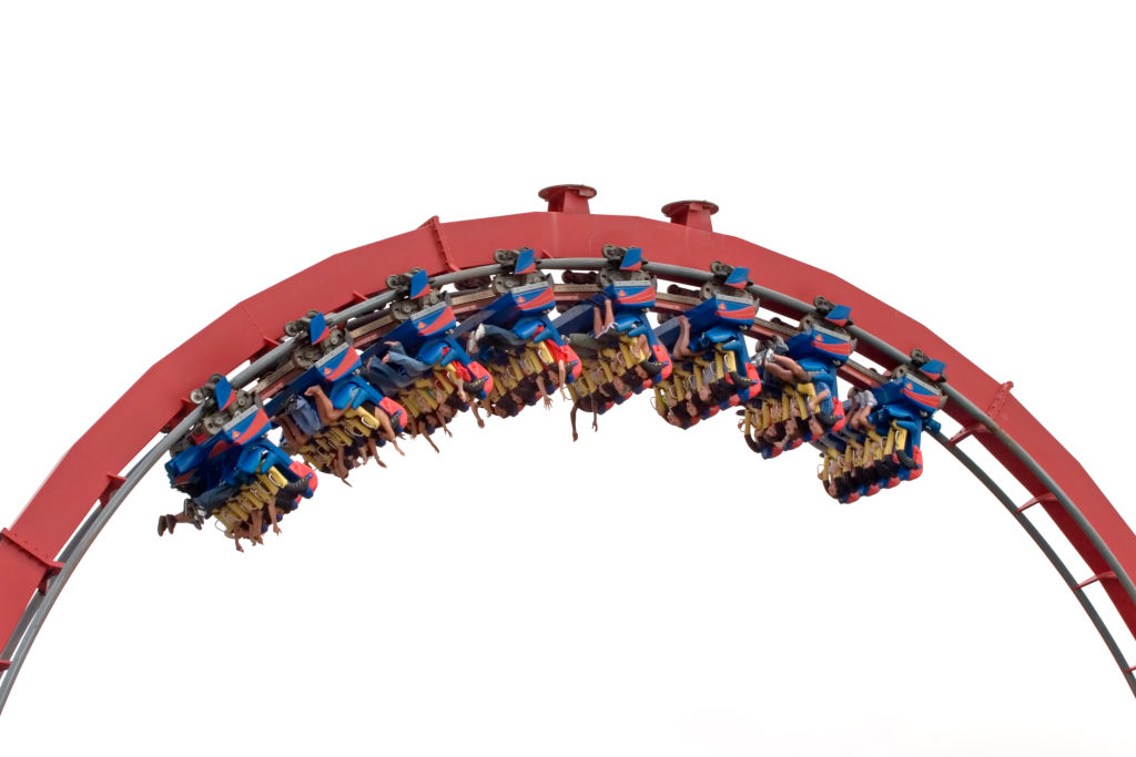 Roller coaster steel car full of riders