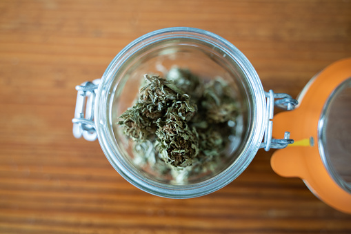 Jar full of marijuana buds