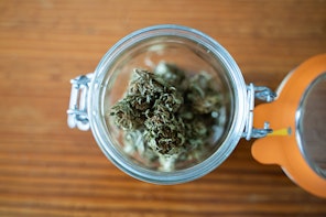 Jar full of marijuana buds