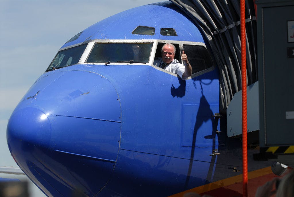 A Southwest pilot gives a thumbs up