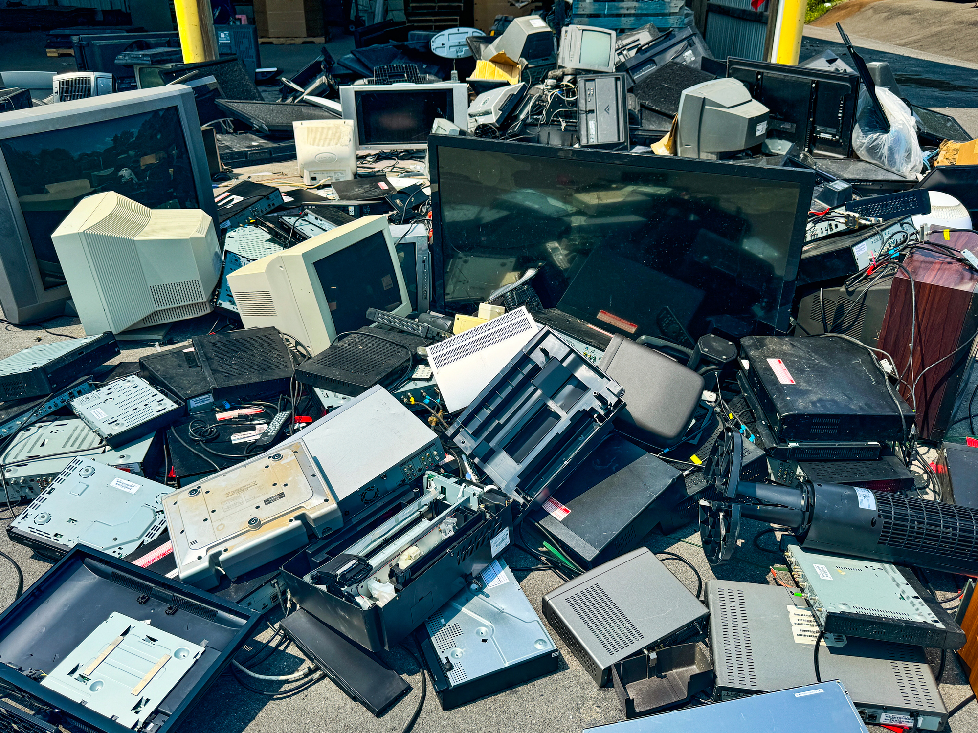 Old electronic items tossed on ground for disposal, Hudson