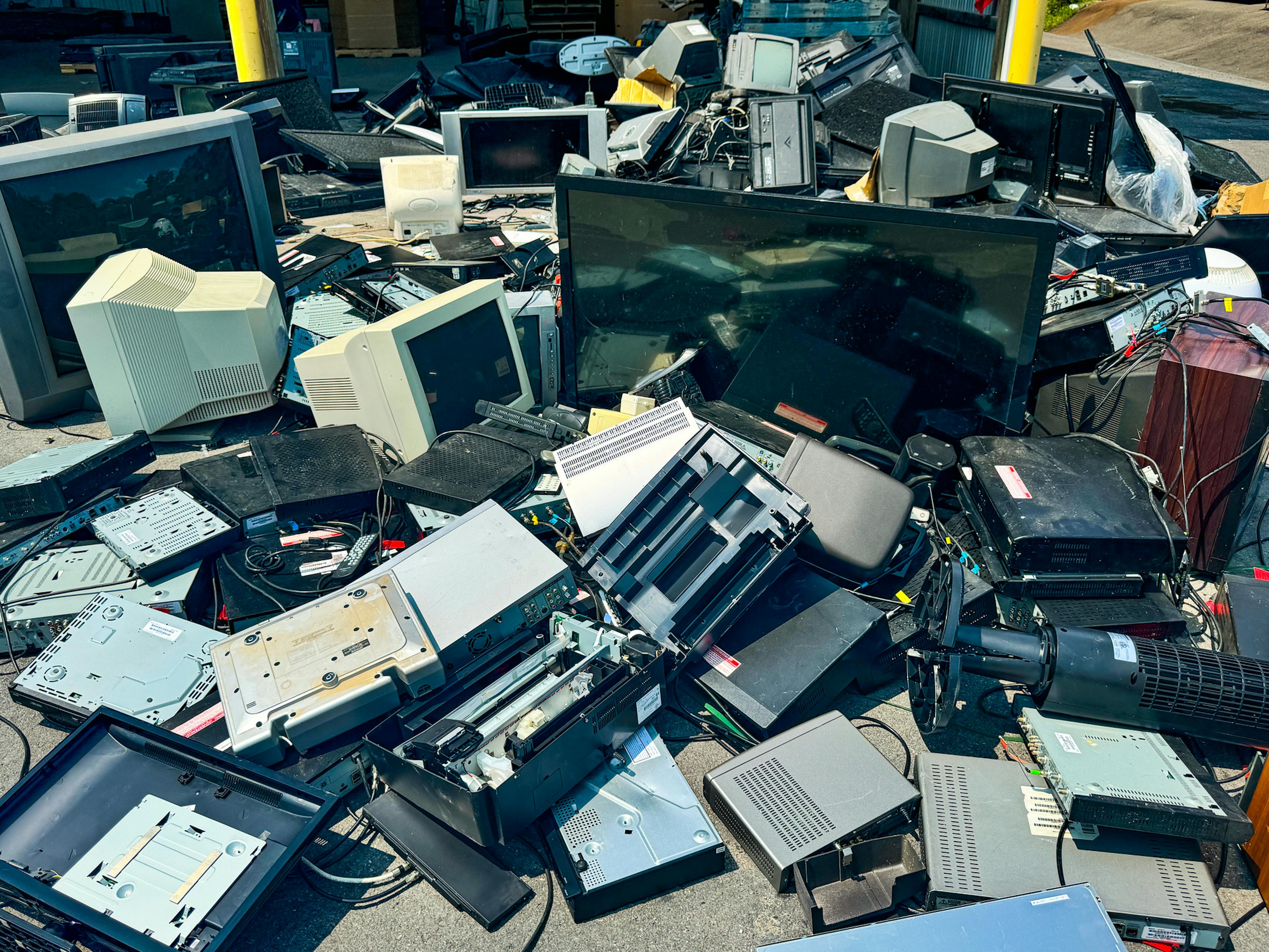 Old electronic items tossed on ground for disposal, Hudson