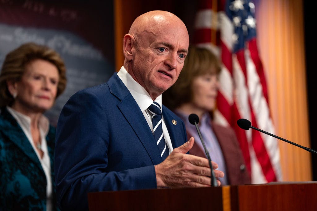 Senator Mark Kelly wants AI companies to pay into a fund to offset AI’s negative impacts thumbnail