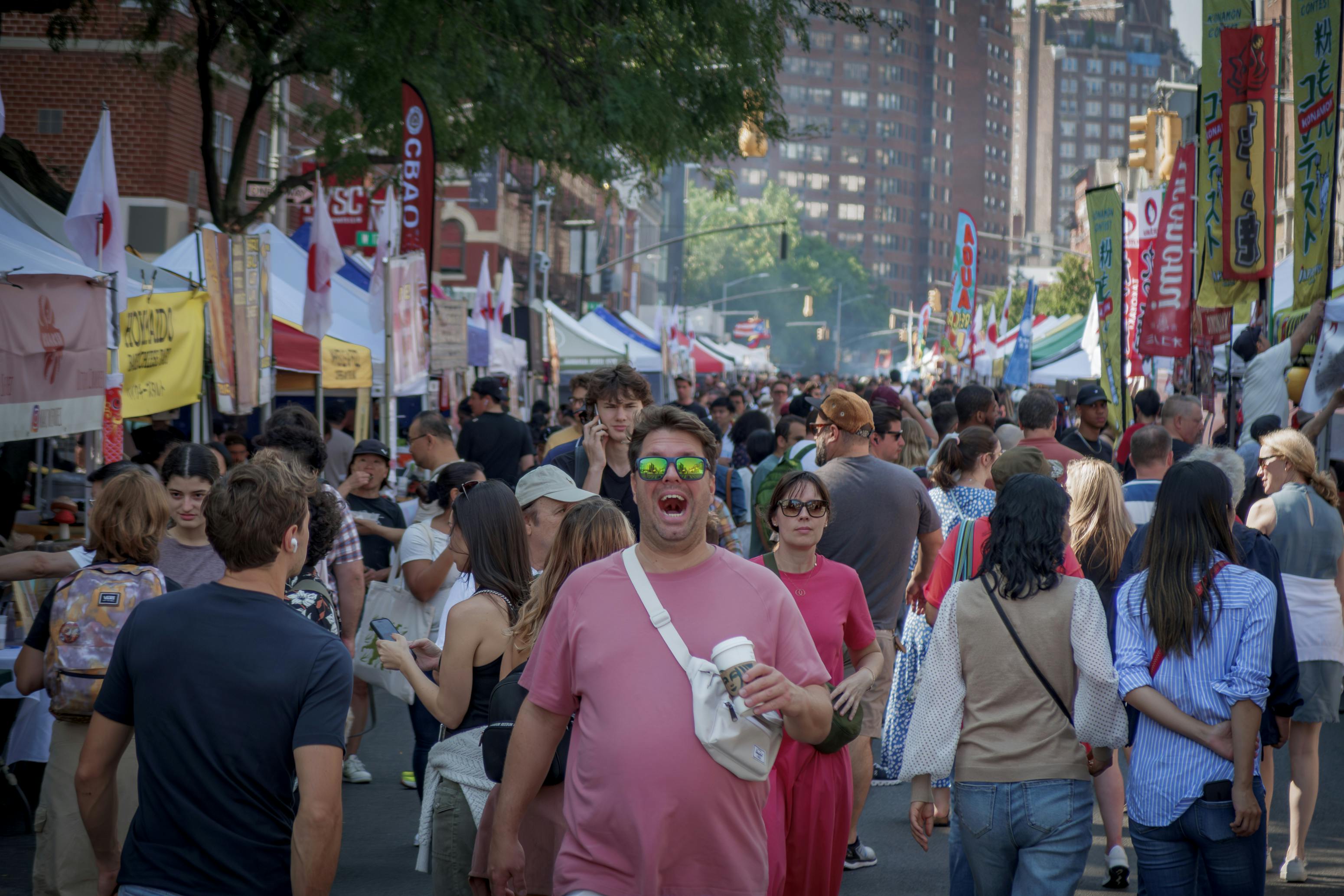 Crowds seen at the Eight Avenue Street Fair...