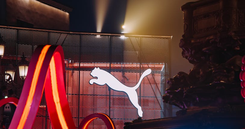 Beijing, China. Glowing Company Logo Of Puma Close Up View. Puma Se Is German Multinational Corporation Who Design And Manufacture Athletic And Casual Footwear. Sports Lifestyle