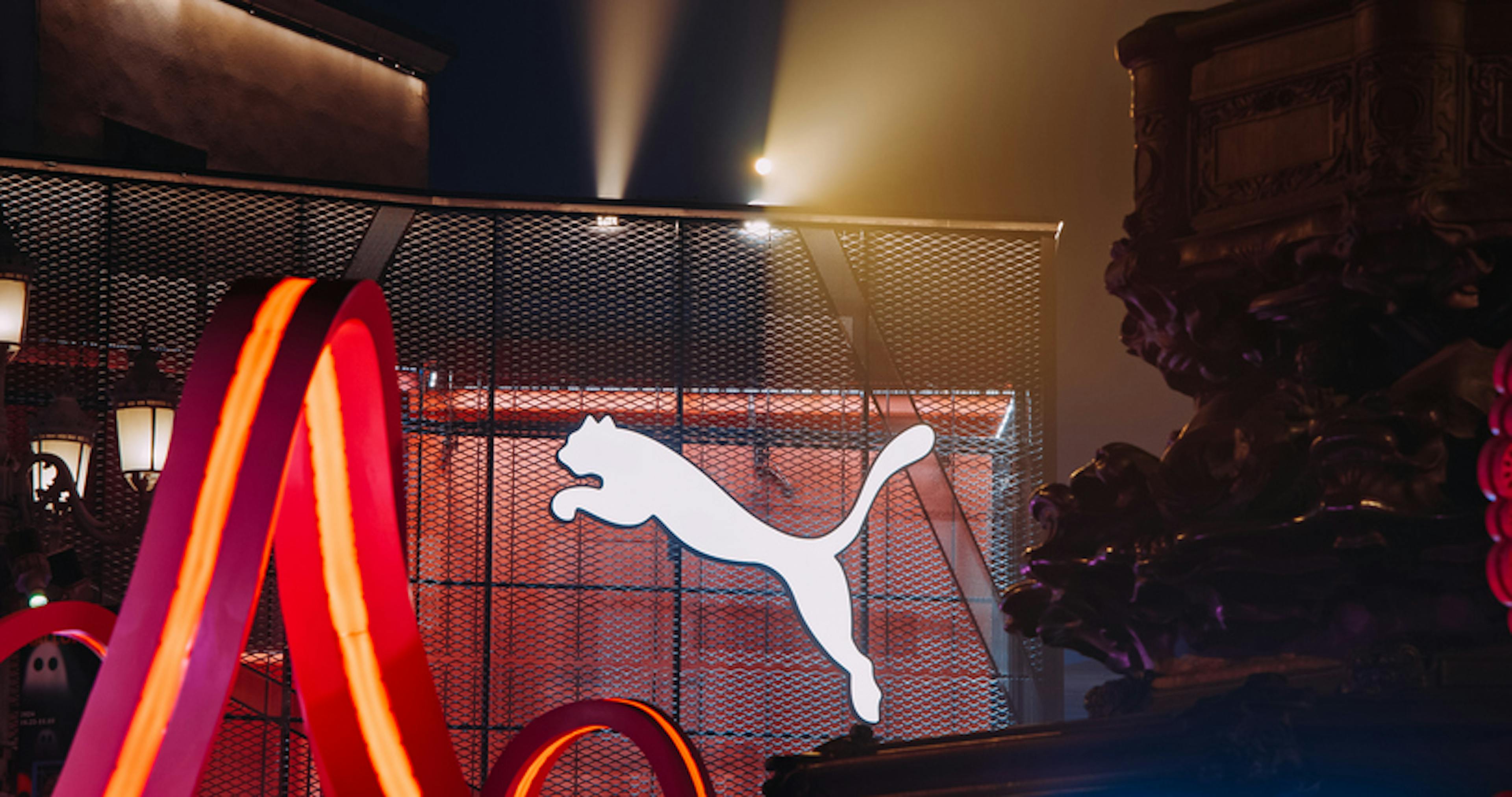 Beijing, China. Glowing Company Logo Of Puma Close Up View. Puma Se Is German Multinational Corporation Who Design And Manufacture Athletic And Casual Footwear. Sports Lifestyle