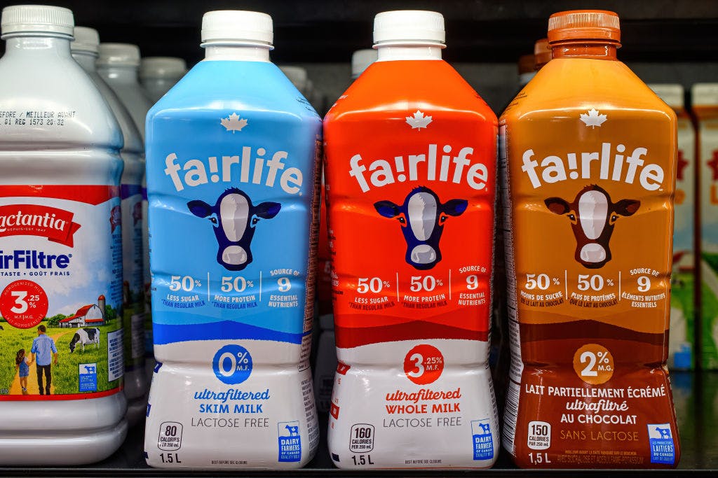 Plastic bottles and label for Fairlife milk on a retail...