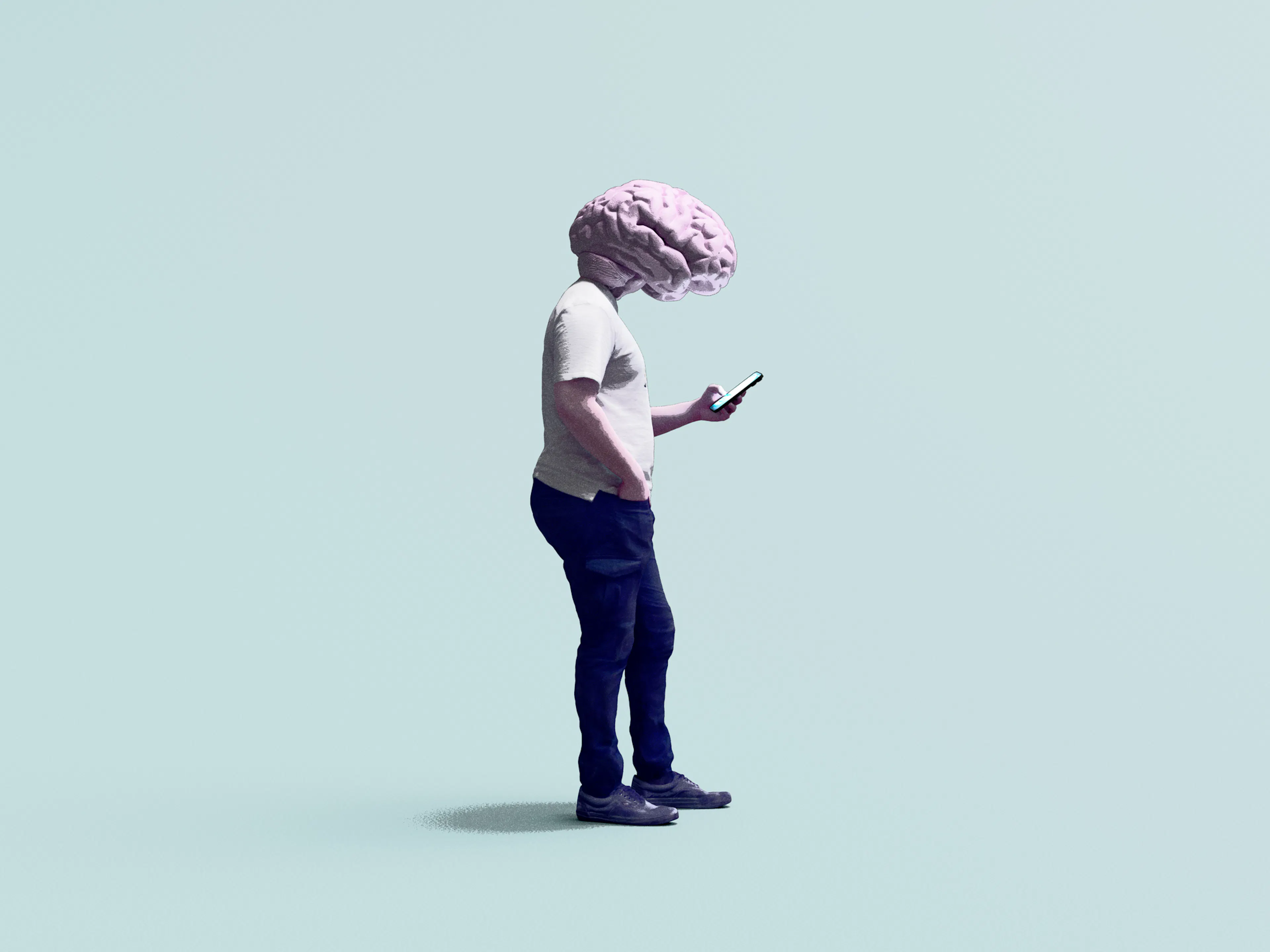 Man using smartphone, his head is replaced with a huge brain