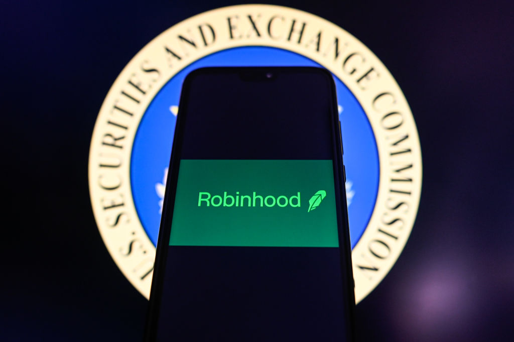 In this photo illustration, the RobinHood logo is displayed...