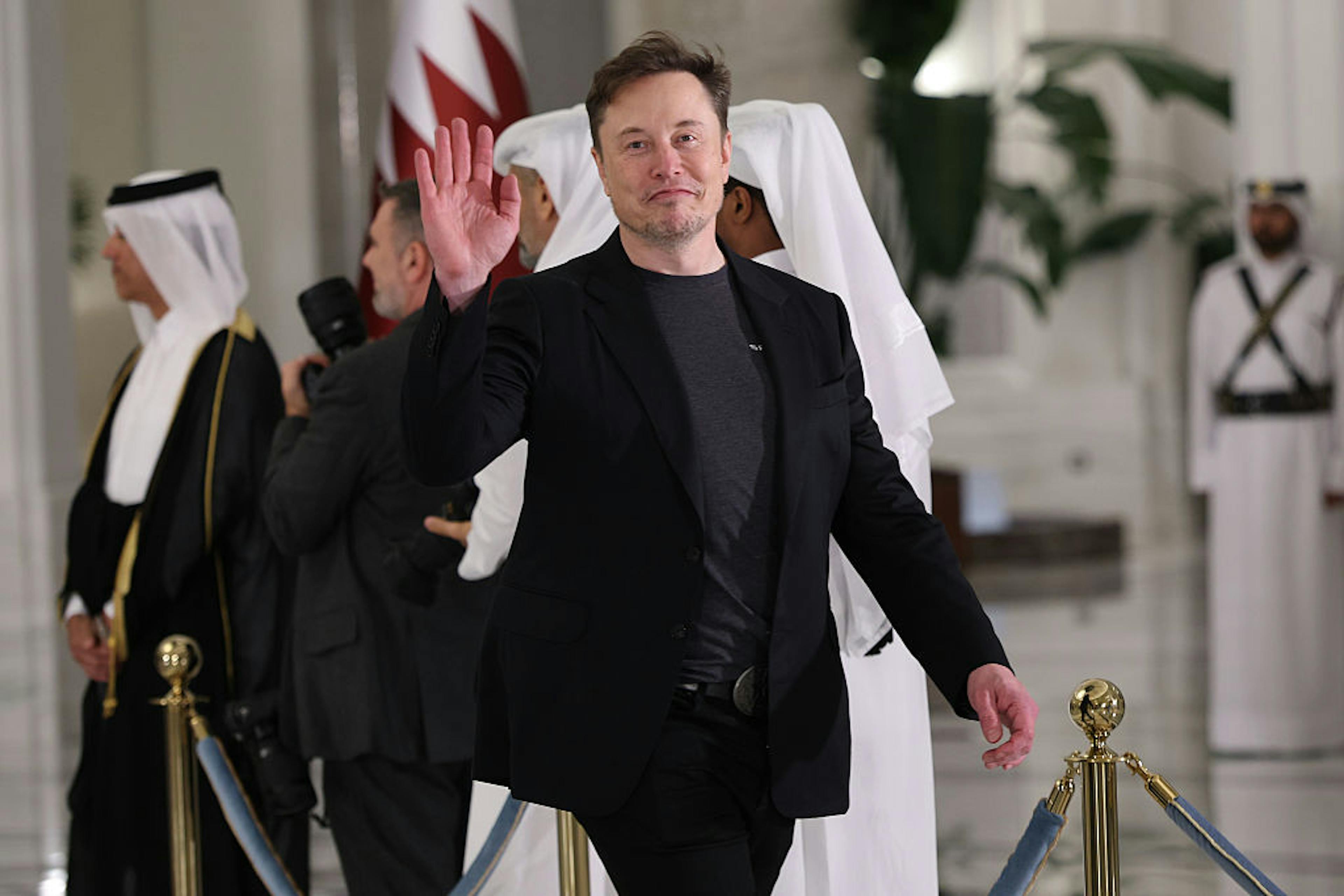 Elon Musk waving