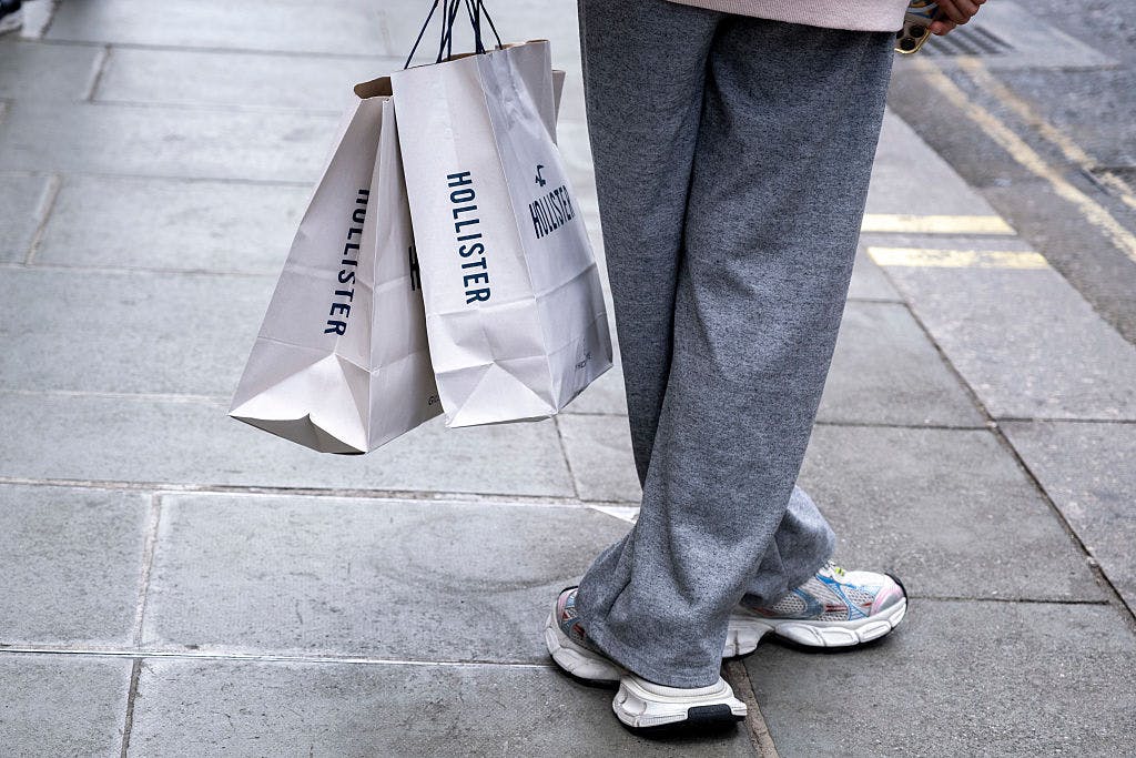 Oxford Street shopper with Hollister bag in London