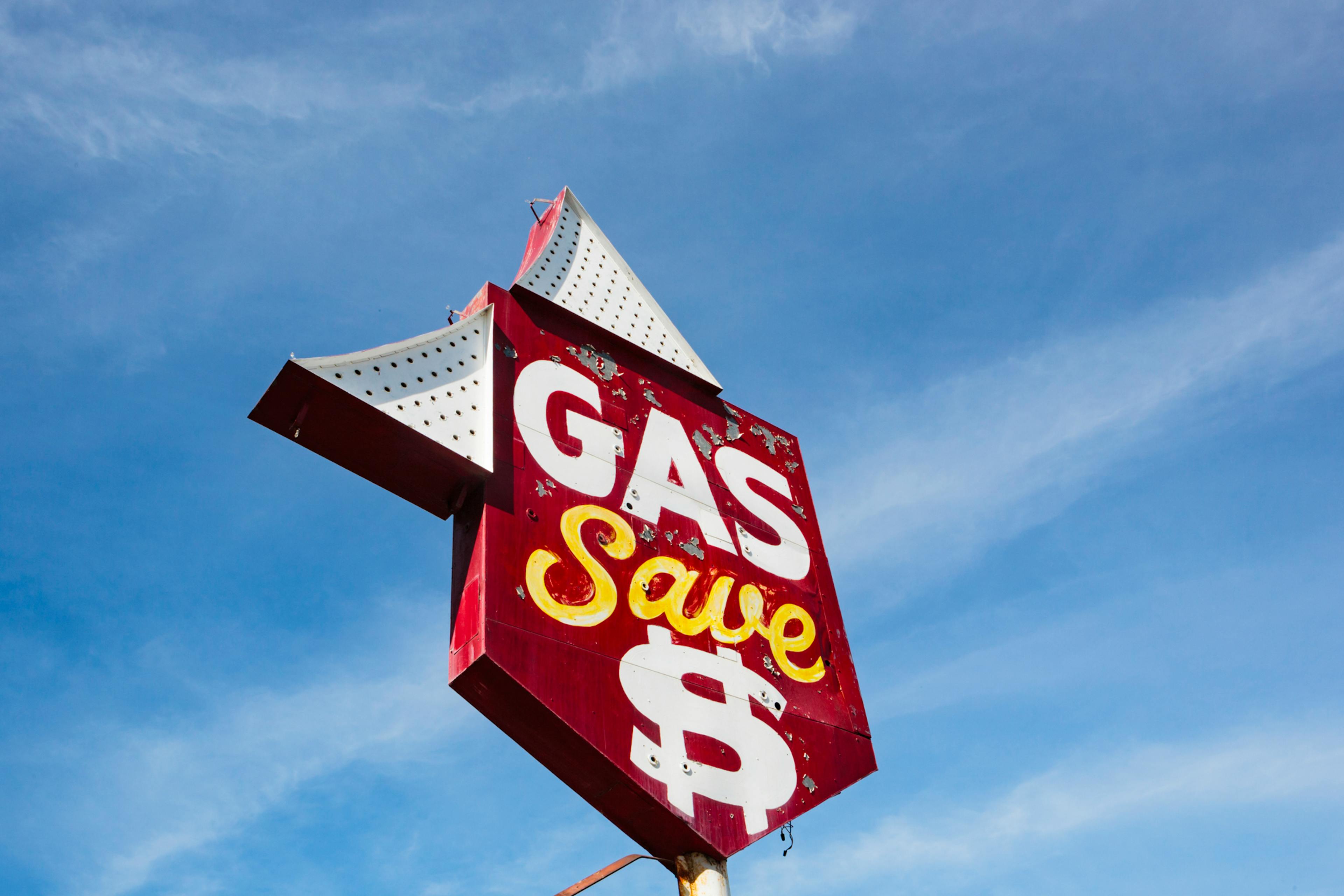 Retro outdoor sign to save money on gas, Save $ on fuel