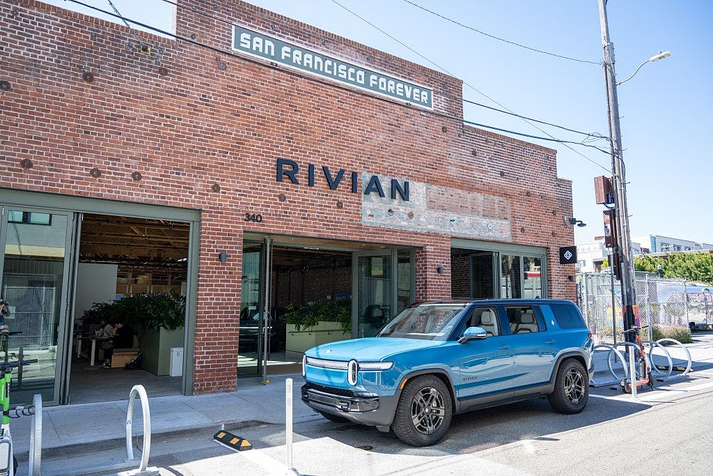 Rivian lays off workers as it readies its cheaper SUV and braces for the end of the EV tax credit thumbnail