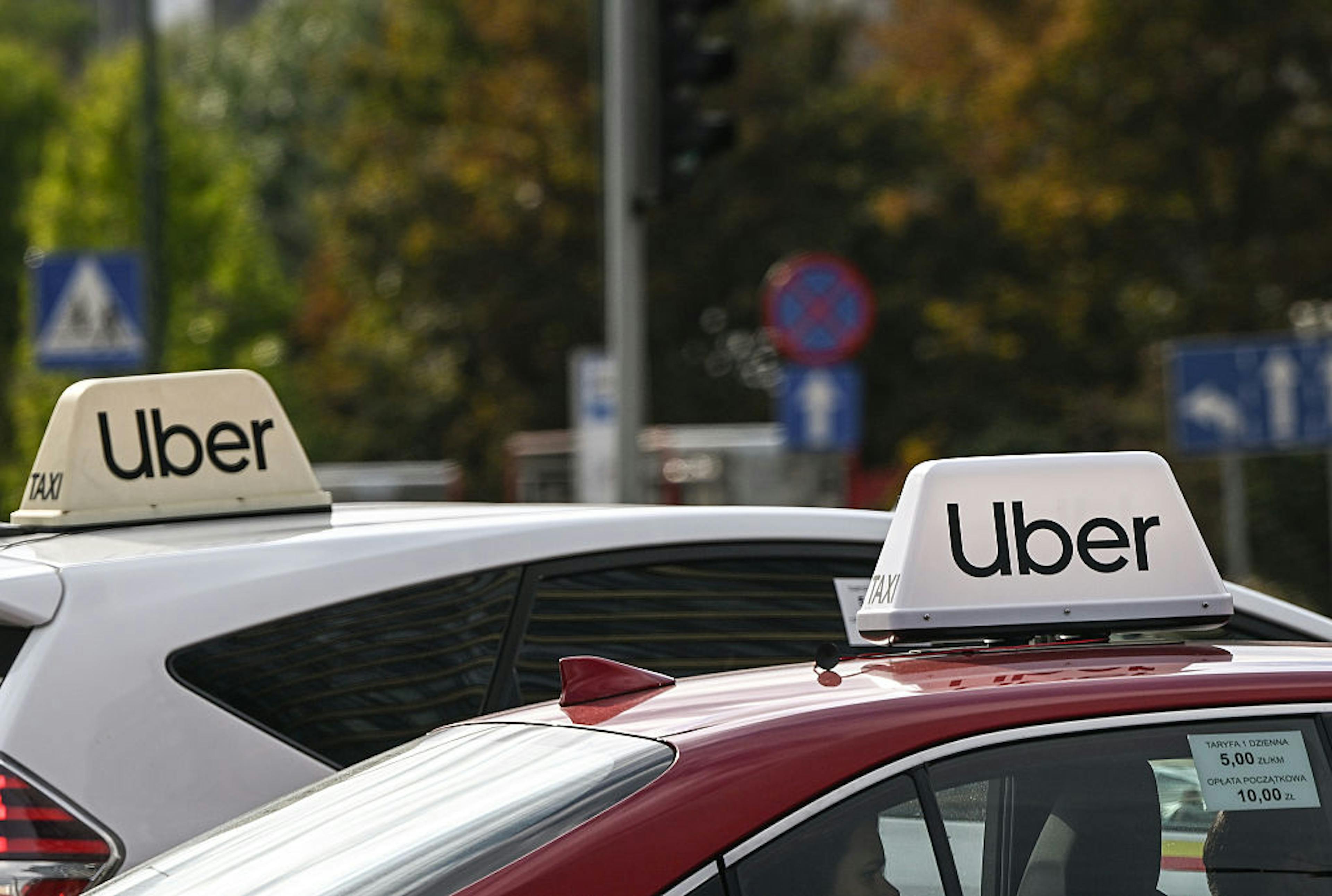 Two Uber vehicles together