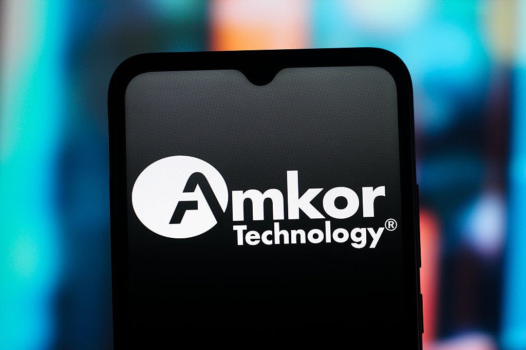 Amkor rises after breaking ground on its new semiconductor packaging campus in Arizona, while increasing investment in the project to $7 billion thumbnail