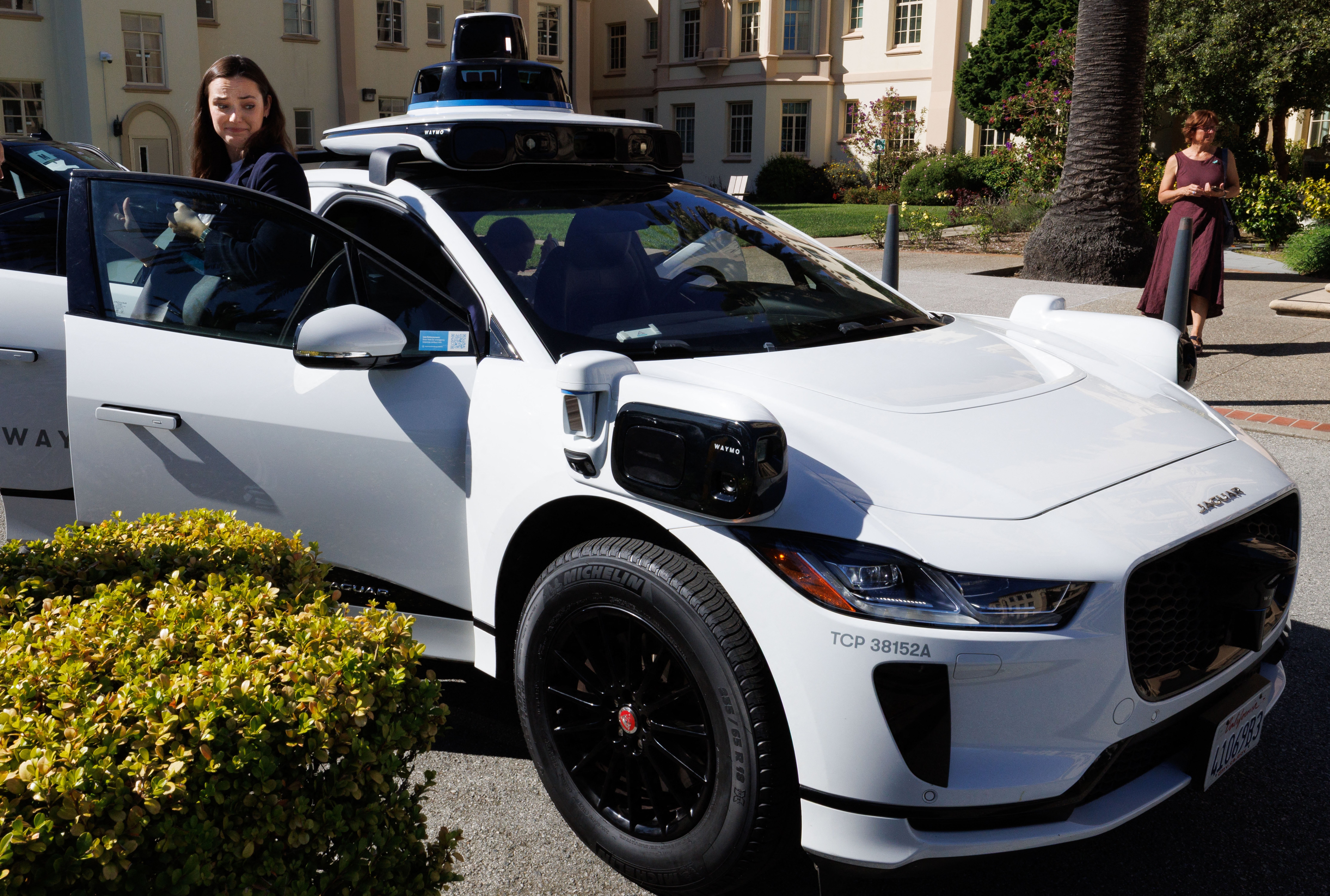 Belgian politician exiting a Waymo