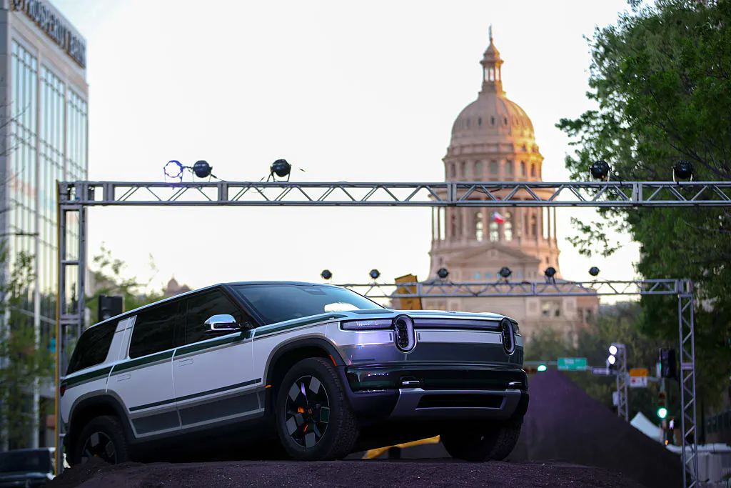 Uber will invest $1.25 billion in Rivian in a new robotaxi deal thumbnail