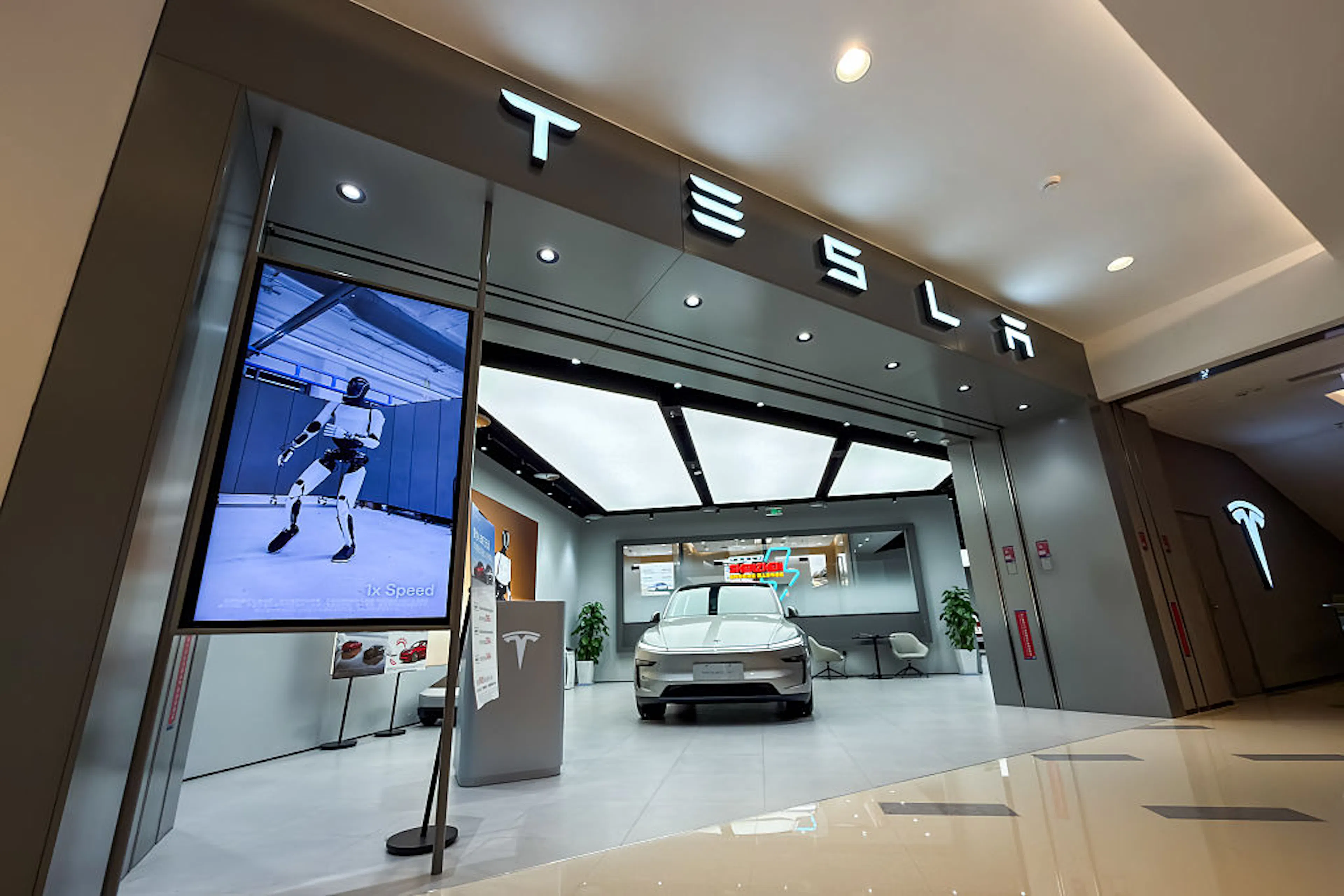 Tesla Showroom Displays Model Y And Optimus Robot Visual In Shenzhen