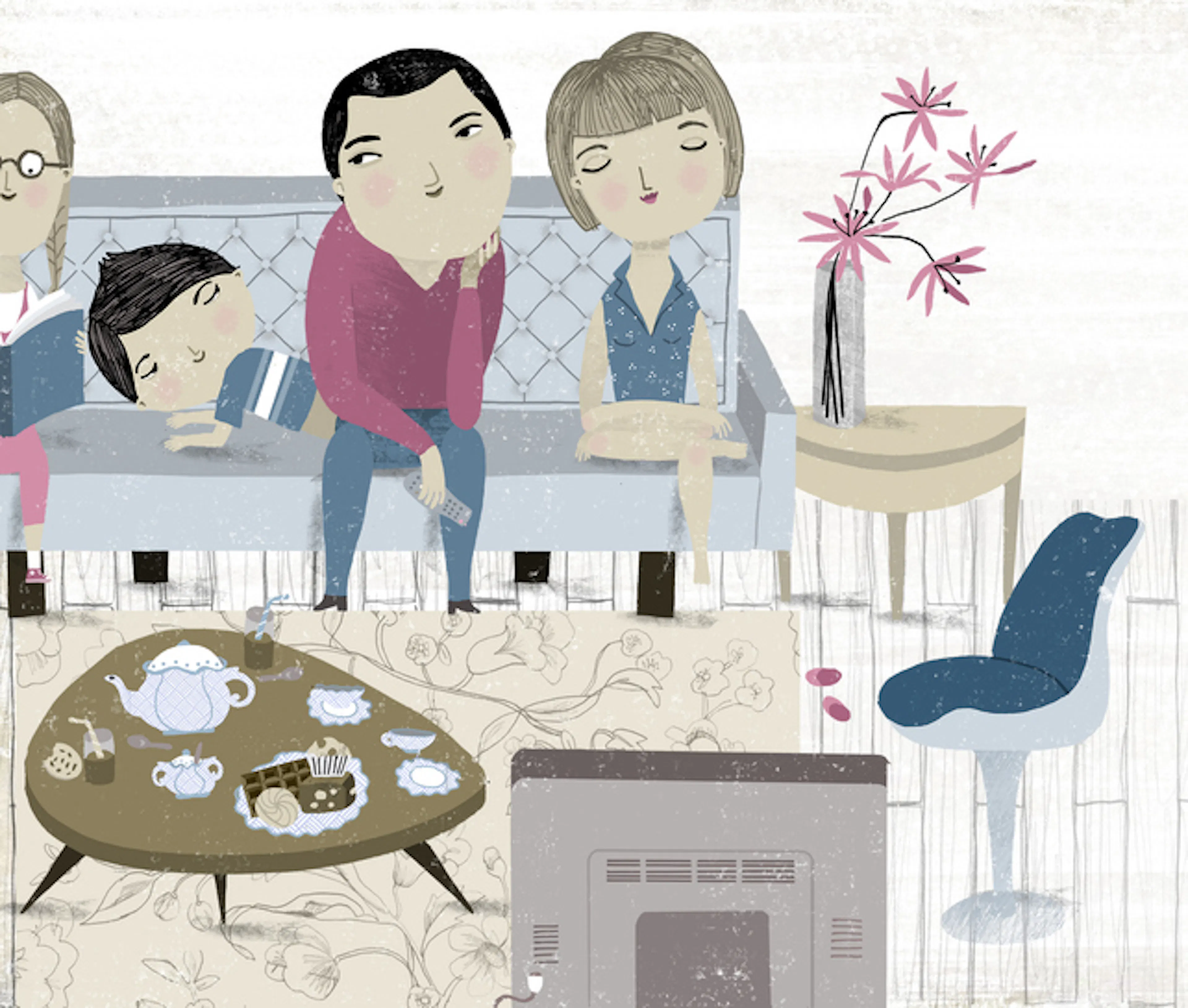 Family in front of TV