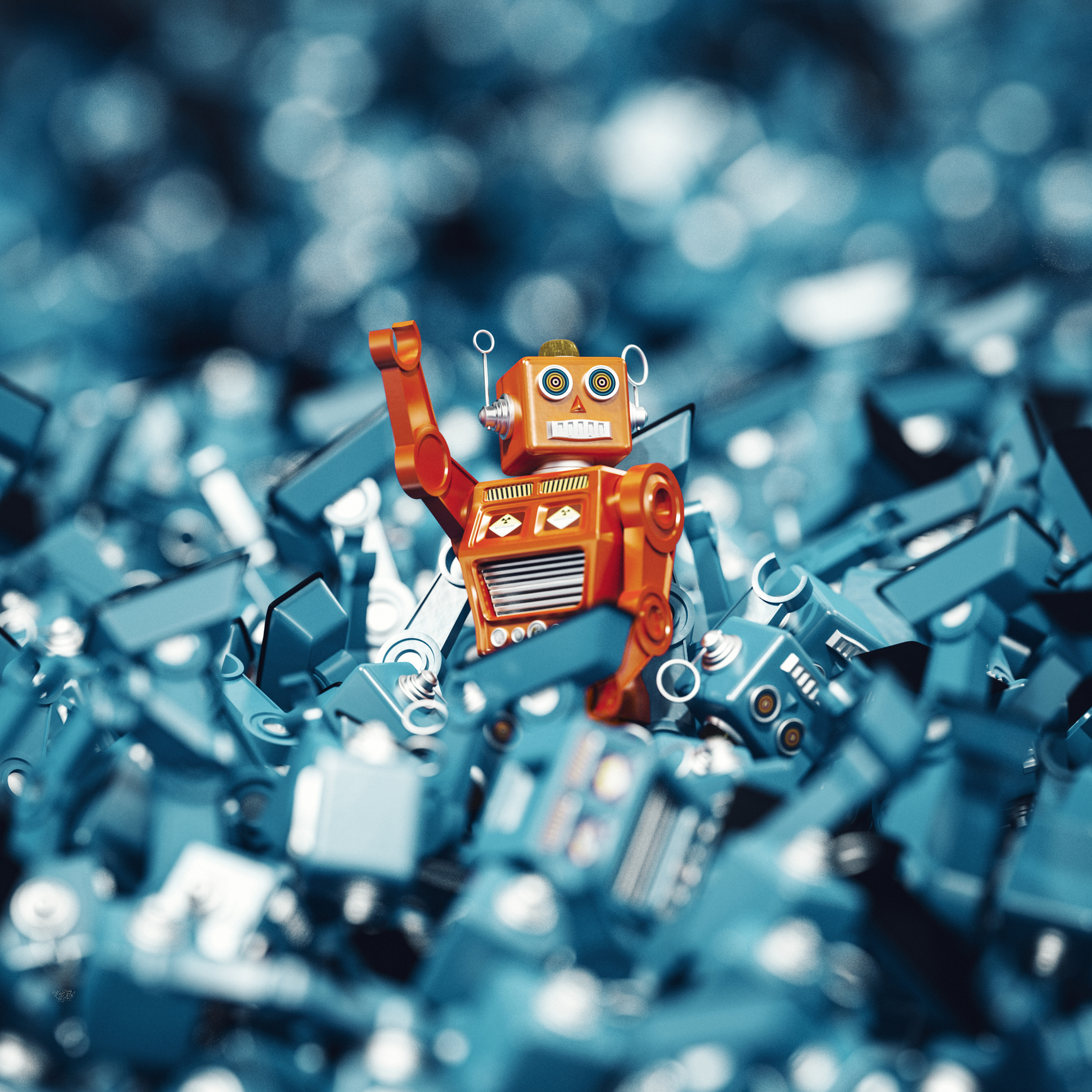 A robot on top of a pile of discarded robot parts