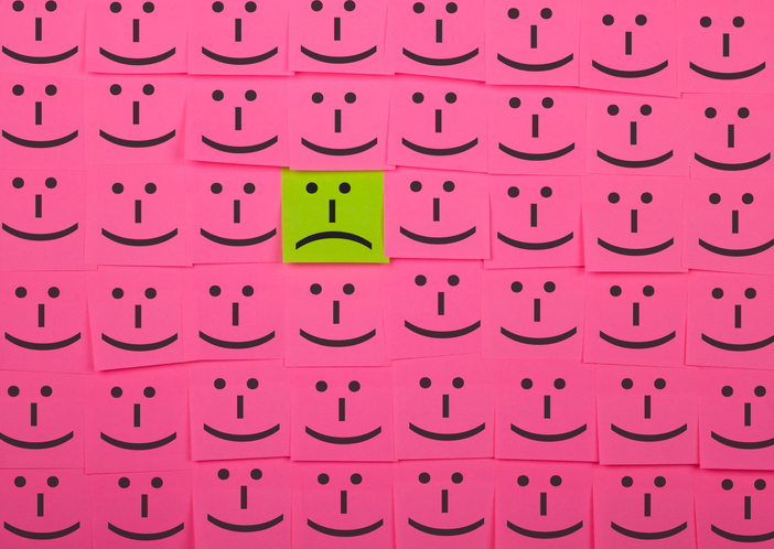 Unhappy and happy concept. Background of Sticky Notes.