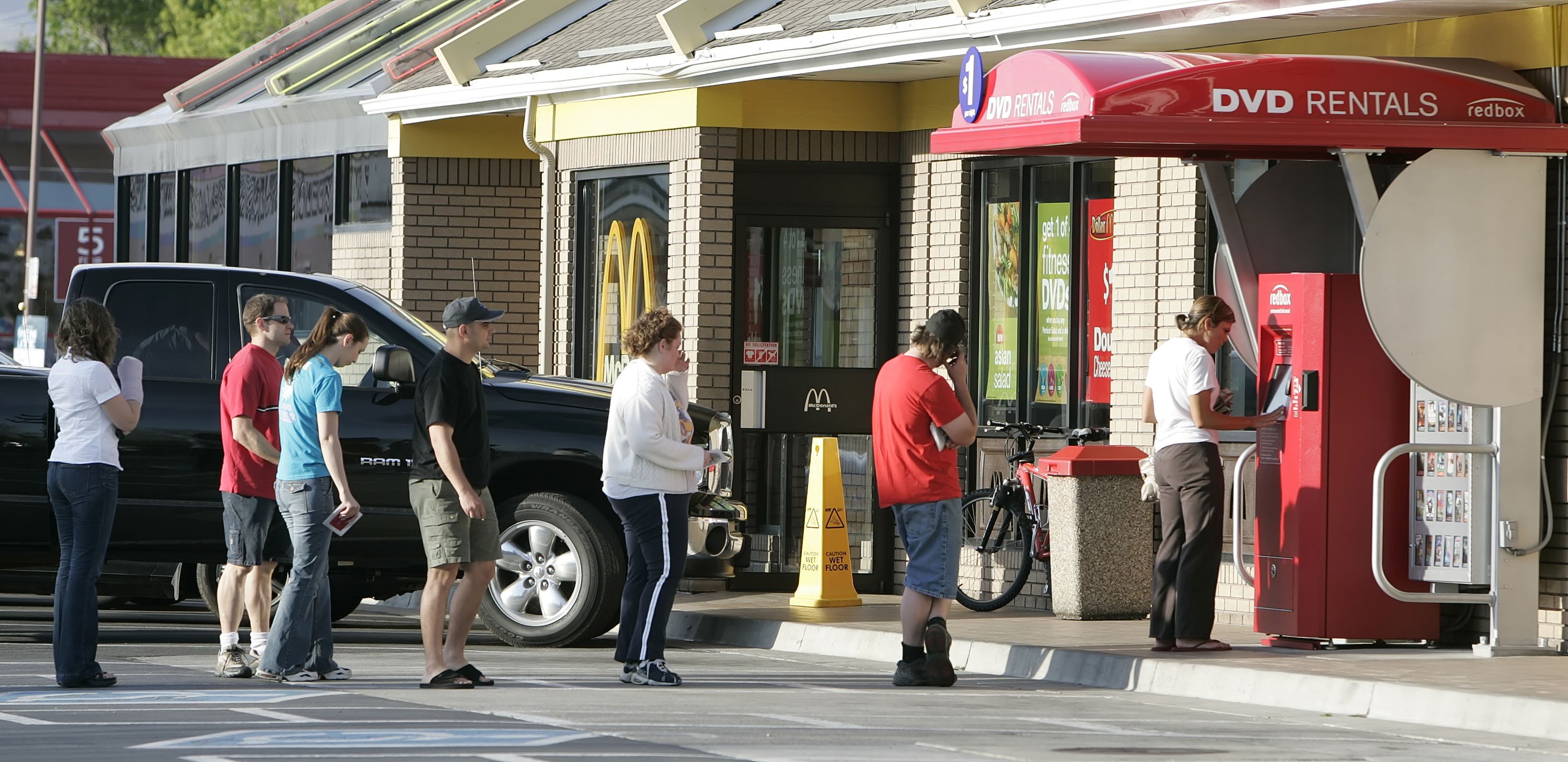 People wait in line at at Redbox in 2006