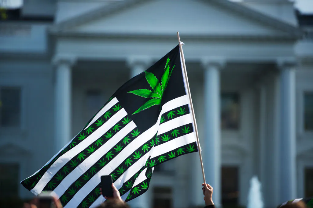 Hundreds of advocates for marijuana legalization rally and smoke pot outside the White House.
