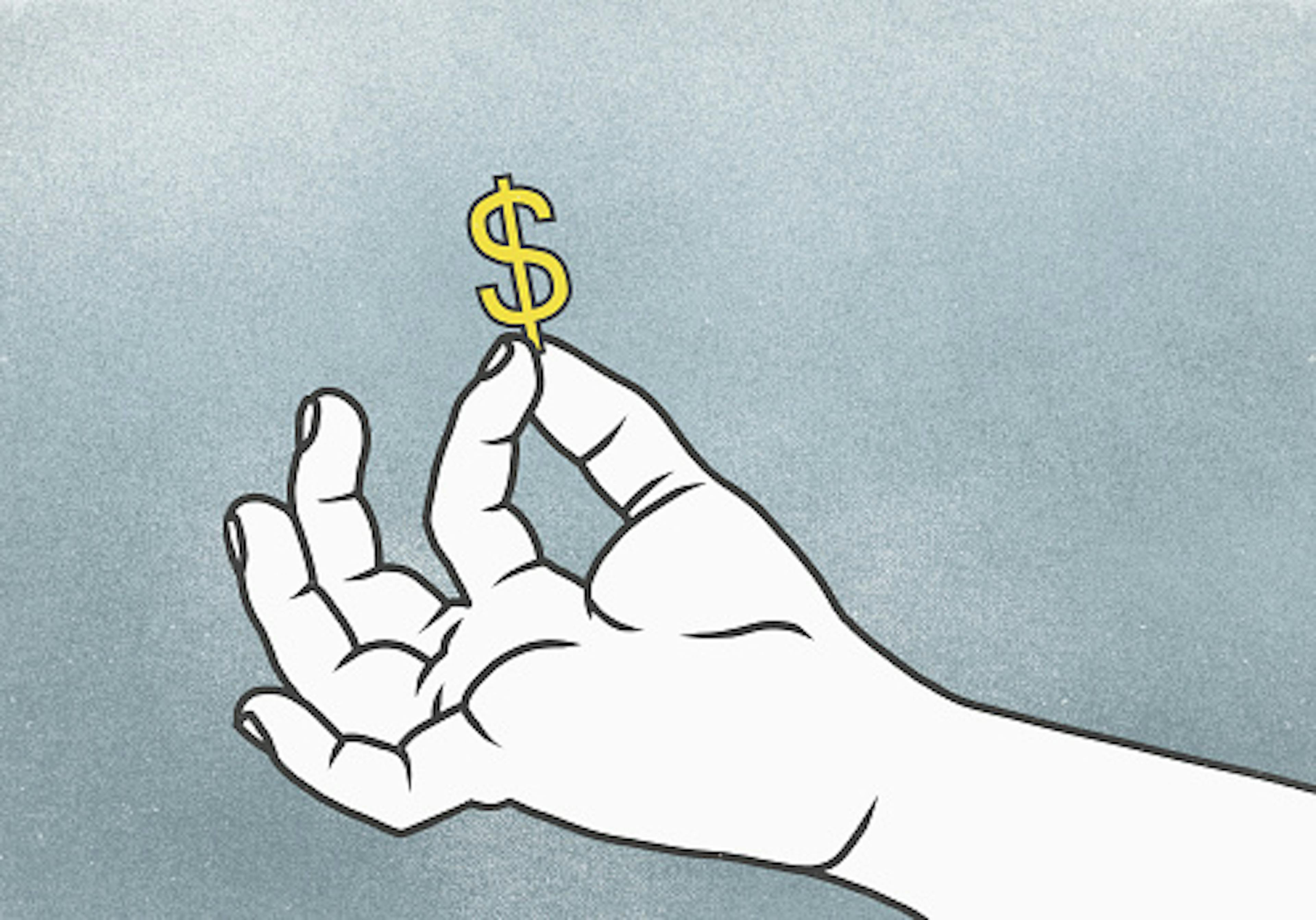 Cropped hand of man holding Dollar sign against gray background