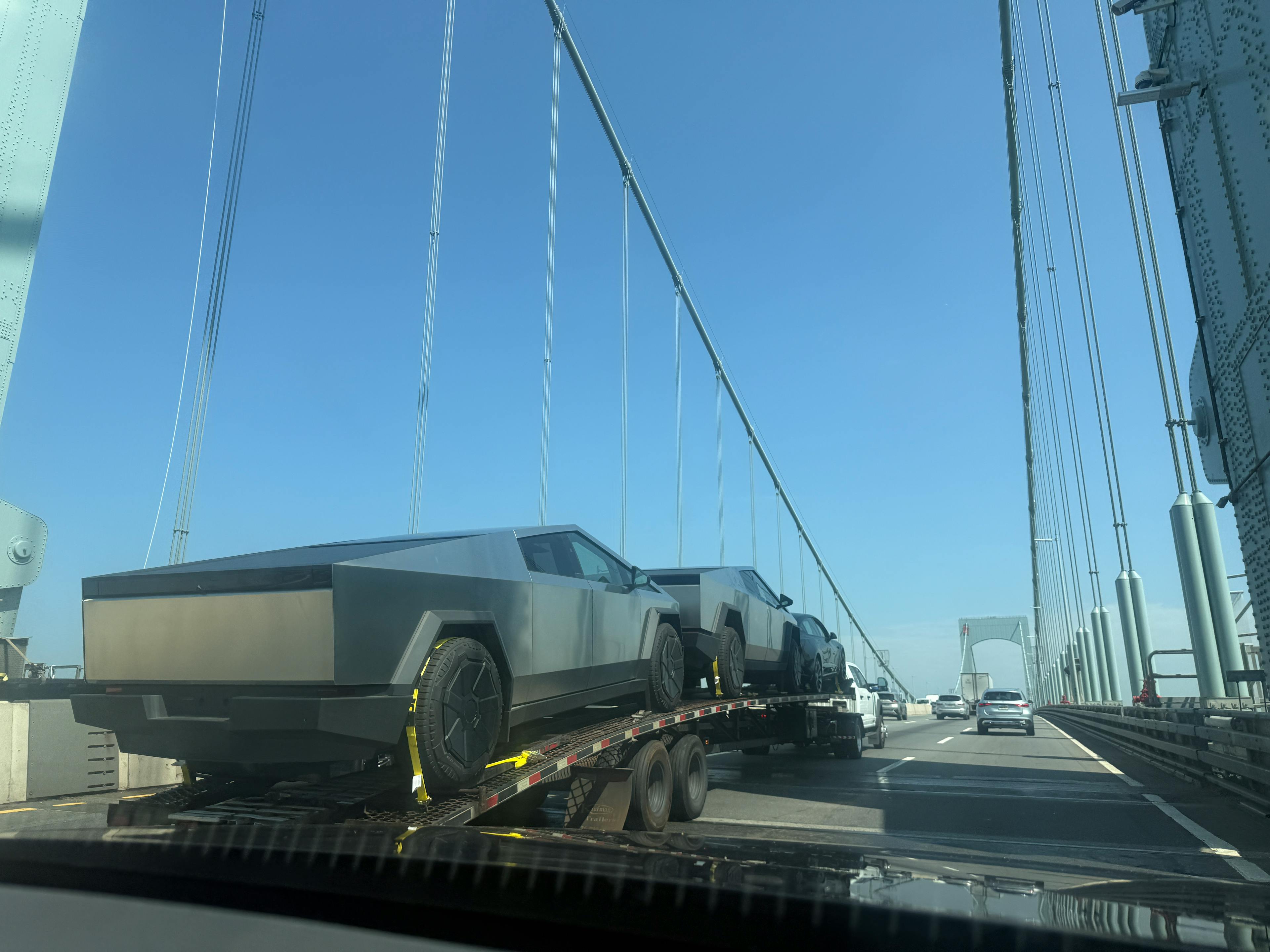 Cybertrucks towed