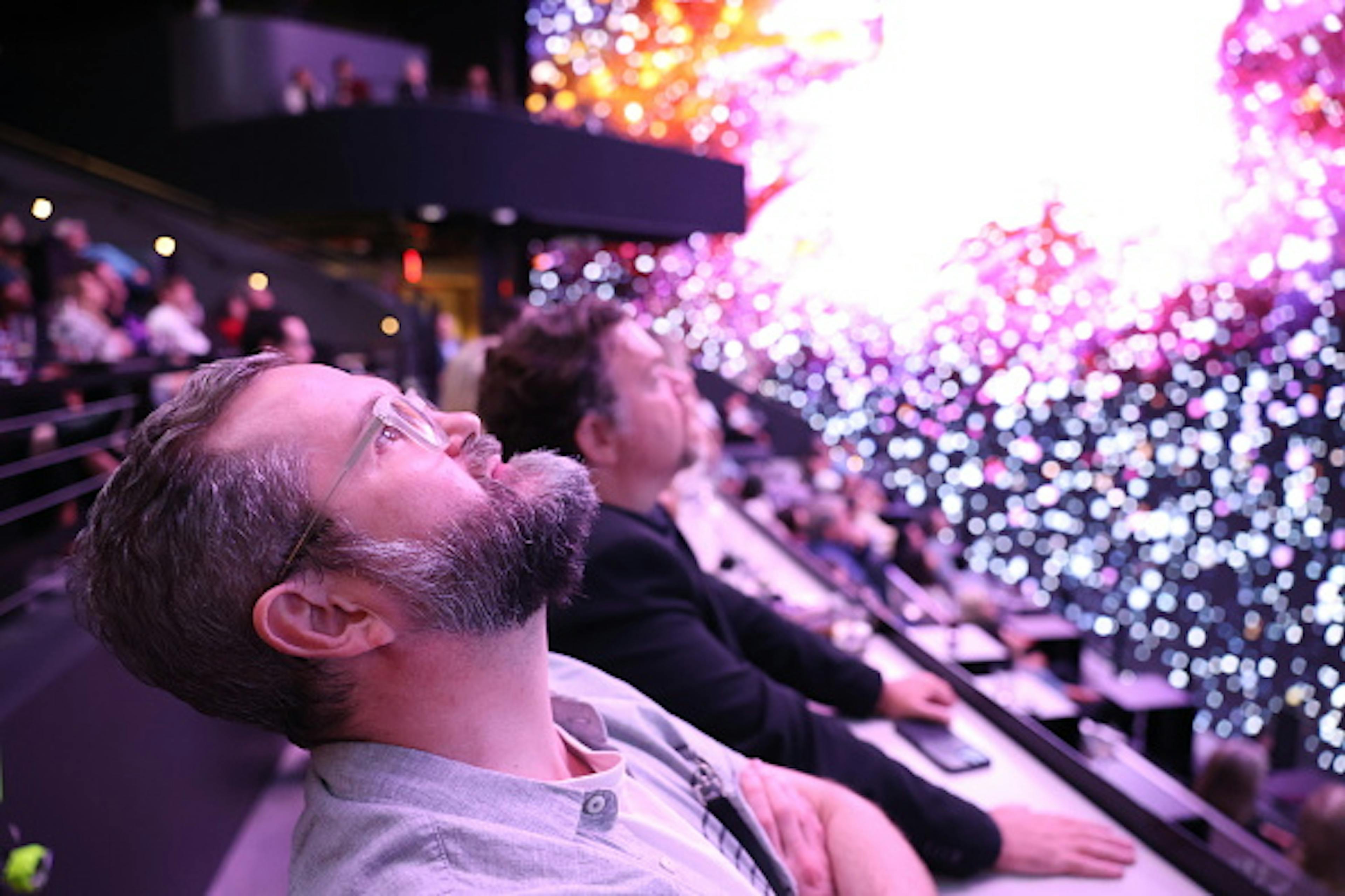 Catching a show at Cosm Los Angeles (Michael Blackshire/Getty Images)